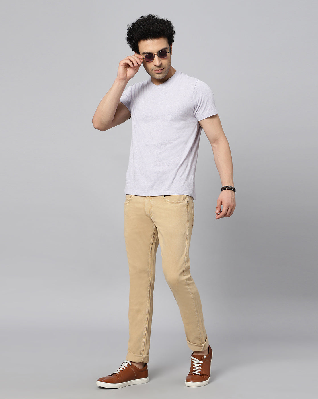 Model wearing TCI Men’s Beige (Fawn) Jeans – showcasing the fit, style, and color from a full-body perspective.