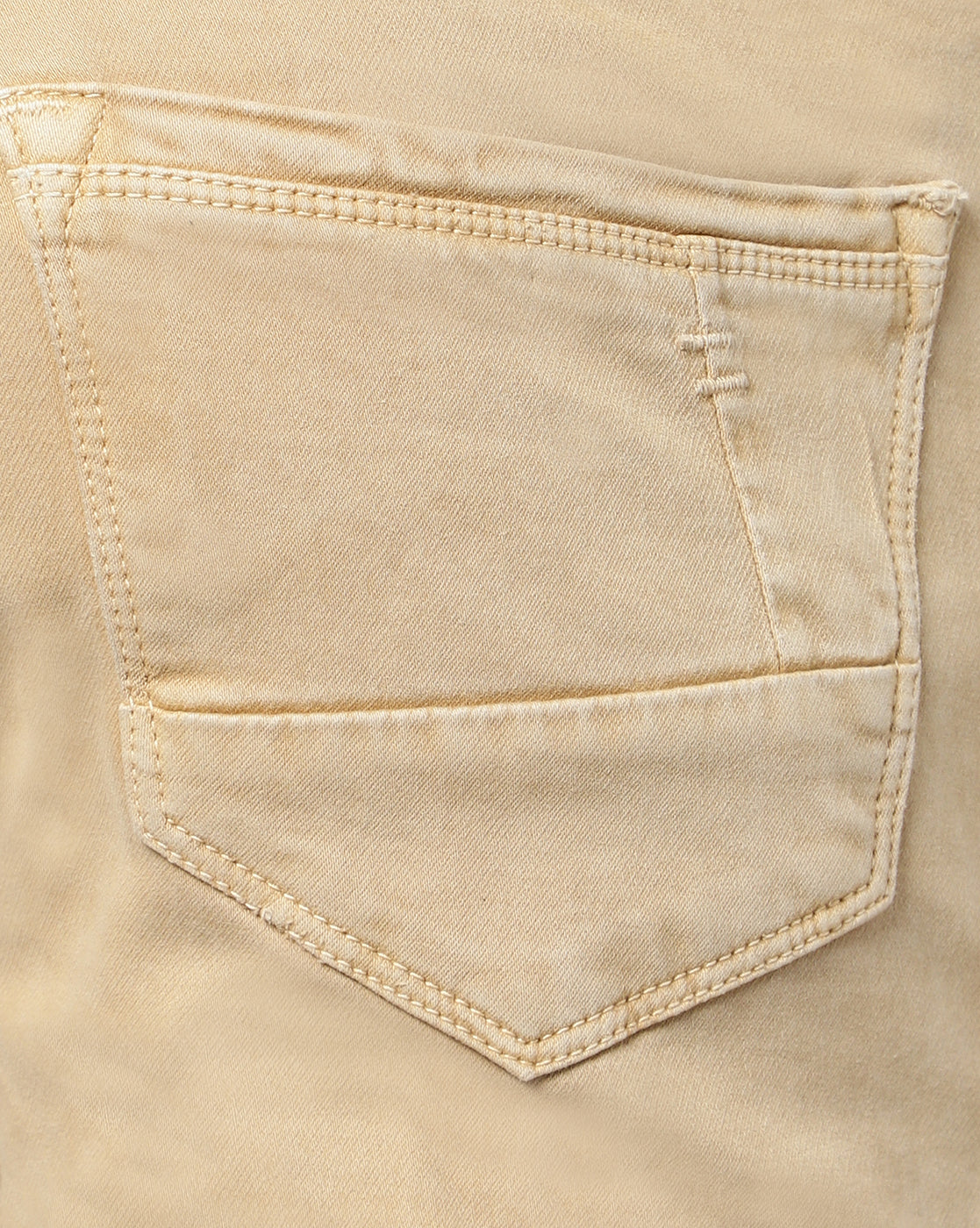 Detailed view of the comfortable front and back pockets on TCI Men’s Beige (Fawn) Jeans.