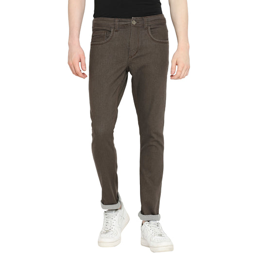 Front view of TCI Men’s Dark Brown Slim Fit Jeans. The image shows the cotton blend fabric, mid-rise waist, slim fit, and five-pocket design including a coin pocket. The jeans feature a zip fly with button closure and a waistband with belt loops.