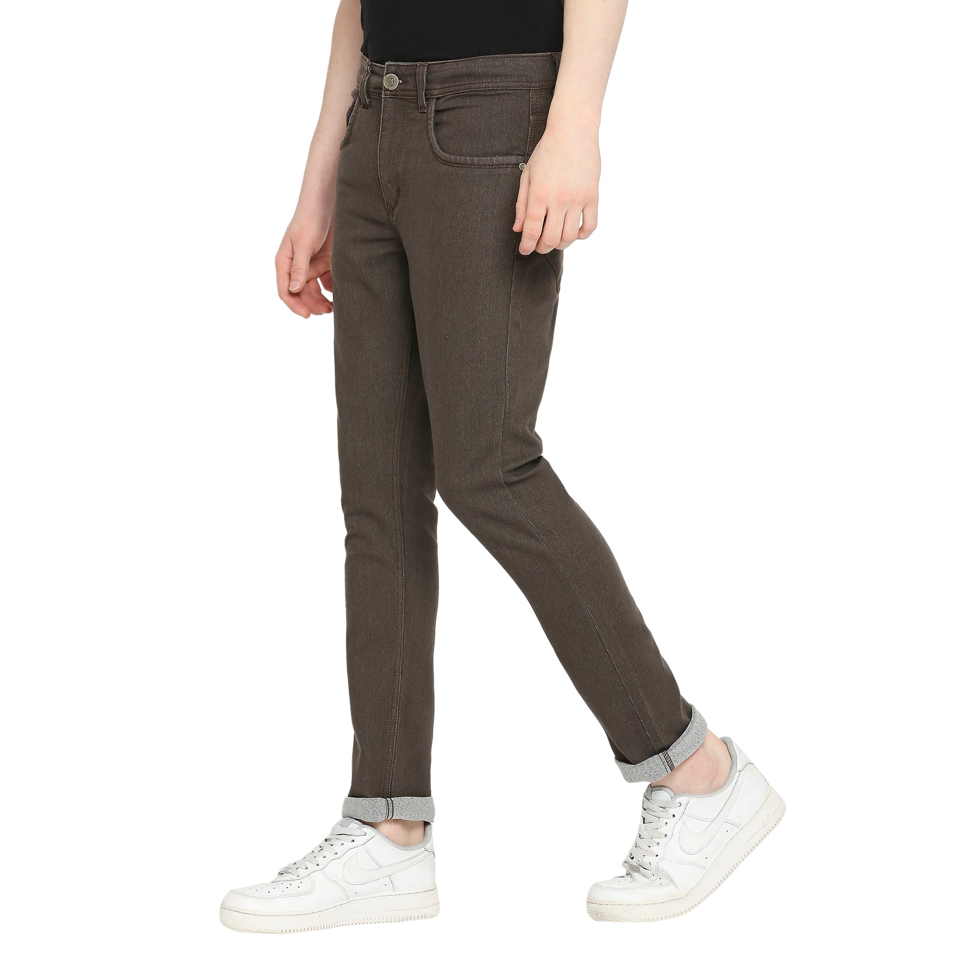 Side view of TCI Men’s Dark Brown Slim Fit Jeans, highlighting the slim fit silhouette, mid-rise waist, and the smooth line of the cotton blend fabric. The image also shows the jeans' five-pocket design and belt loops.