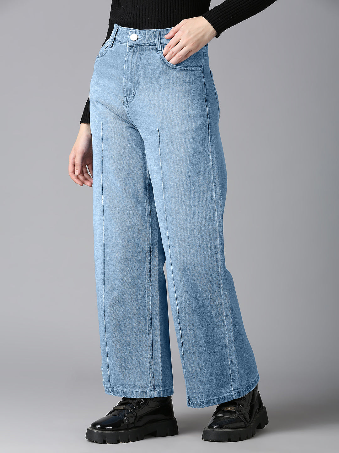 Trendy high-waisted light blue wide-leg jeans by CEFALU, perfect for casual and formal looks.