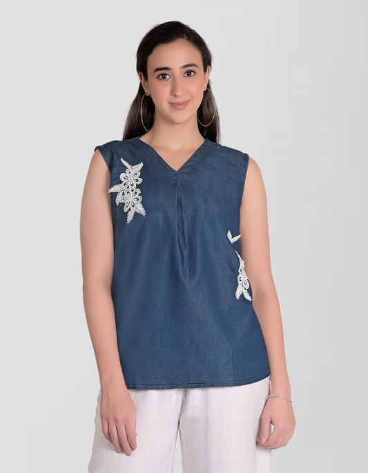 Cefalu Women’s Blue Denim Top - Full front view showcasing sleeveless design and V-neck with patchwork detail.