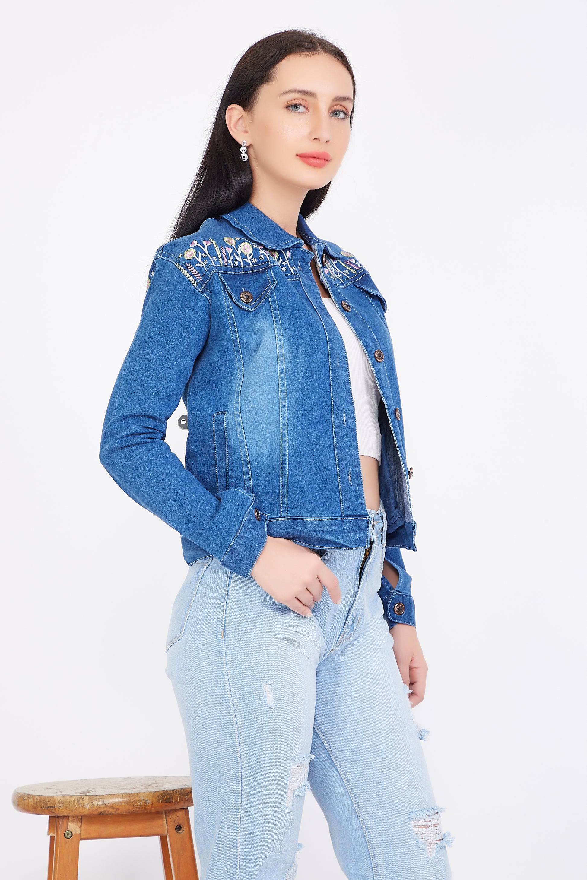 Left side view of a model in Cefalu®️ Blue Denim Jacket for Women, highlighting the jacket’s fit and full sleeves