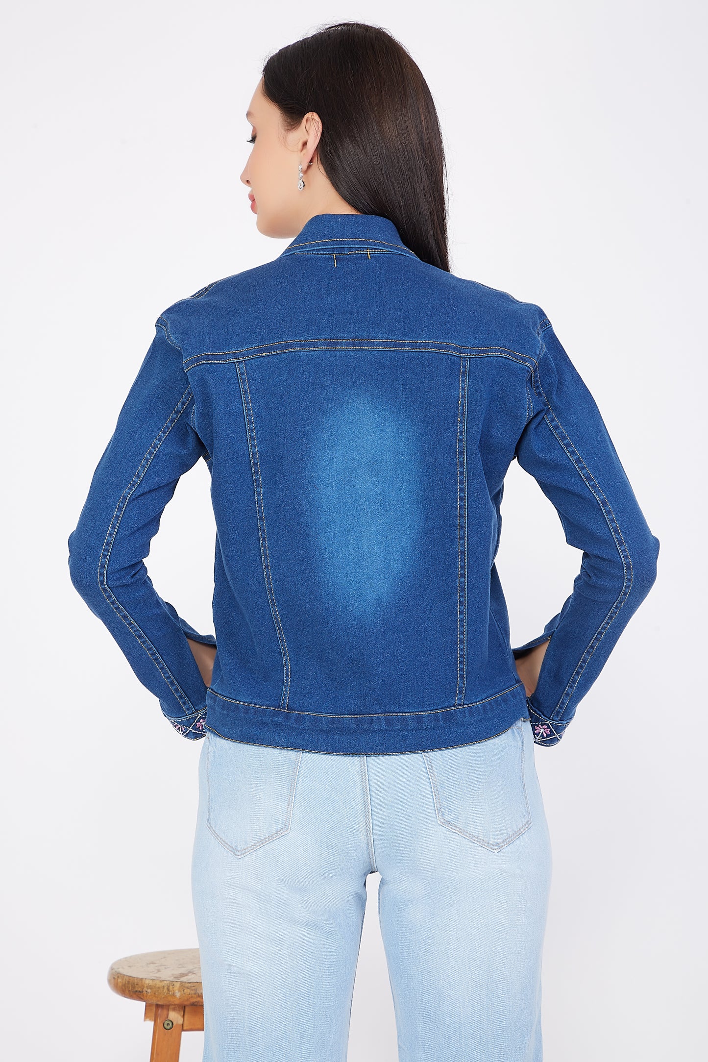 Back view of Cefalu®️ Women’s Embroidered Blue Denim Jacket, highlighting the classic blue denim and elegant embroidery.