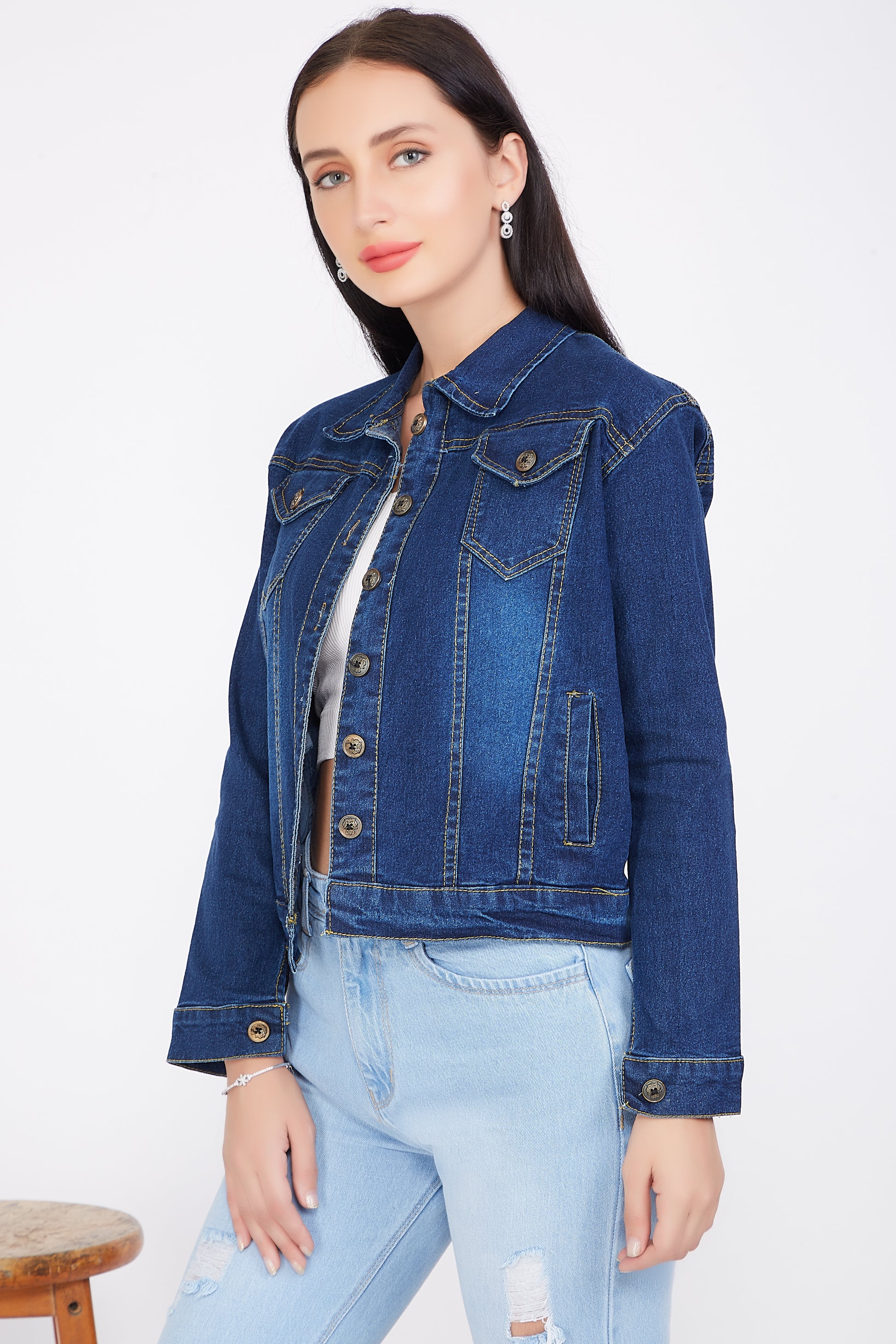 Left side view of a model in Cefalu®️ Dark Blue Denim Jacket for Women, highlighting the jacket’s fit and full sleeves