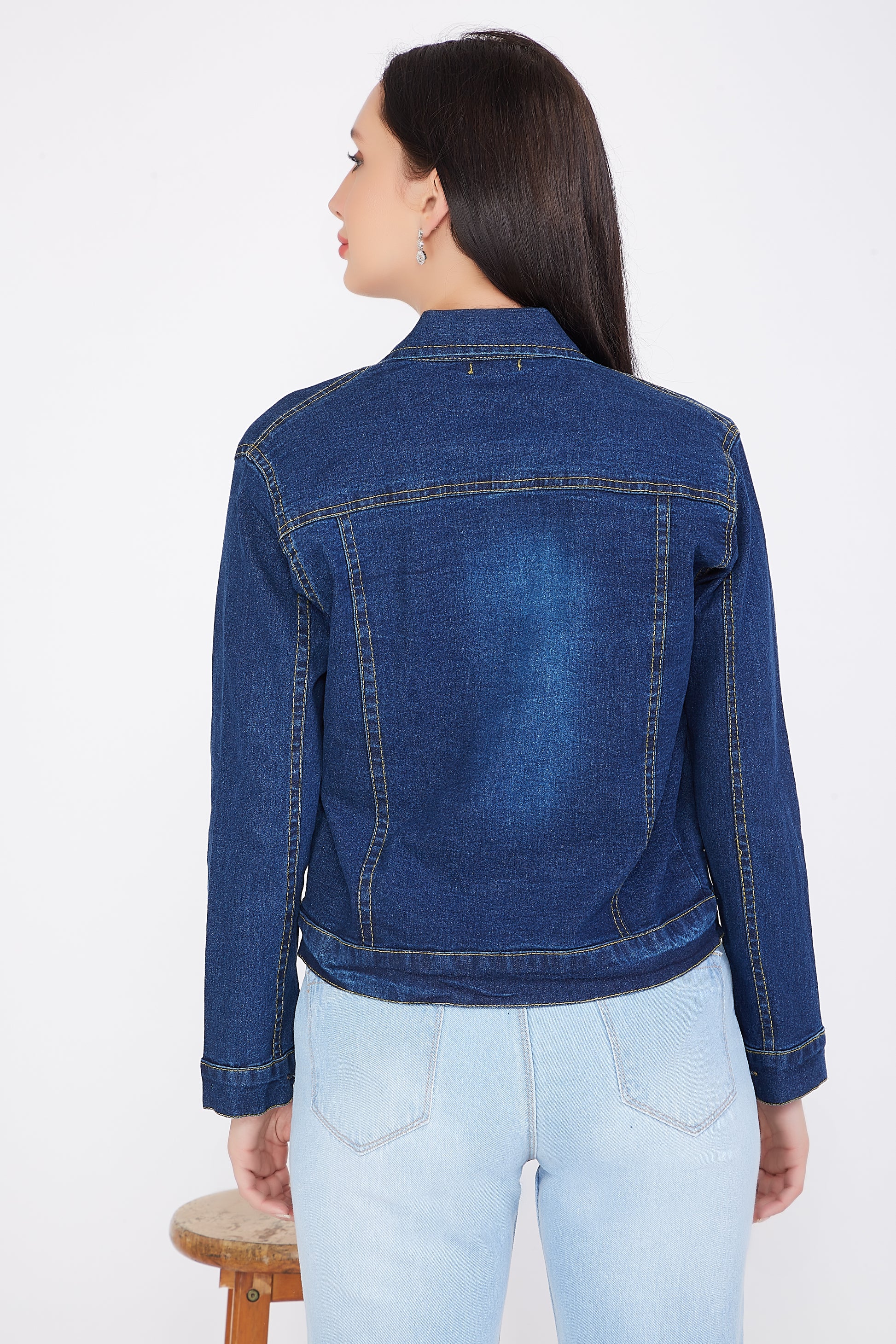 Back view of a model showcasing Cefalu®️ Women’s Dark Blue Denim Jacket with a solid design and full sleeves