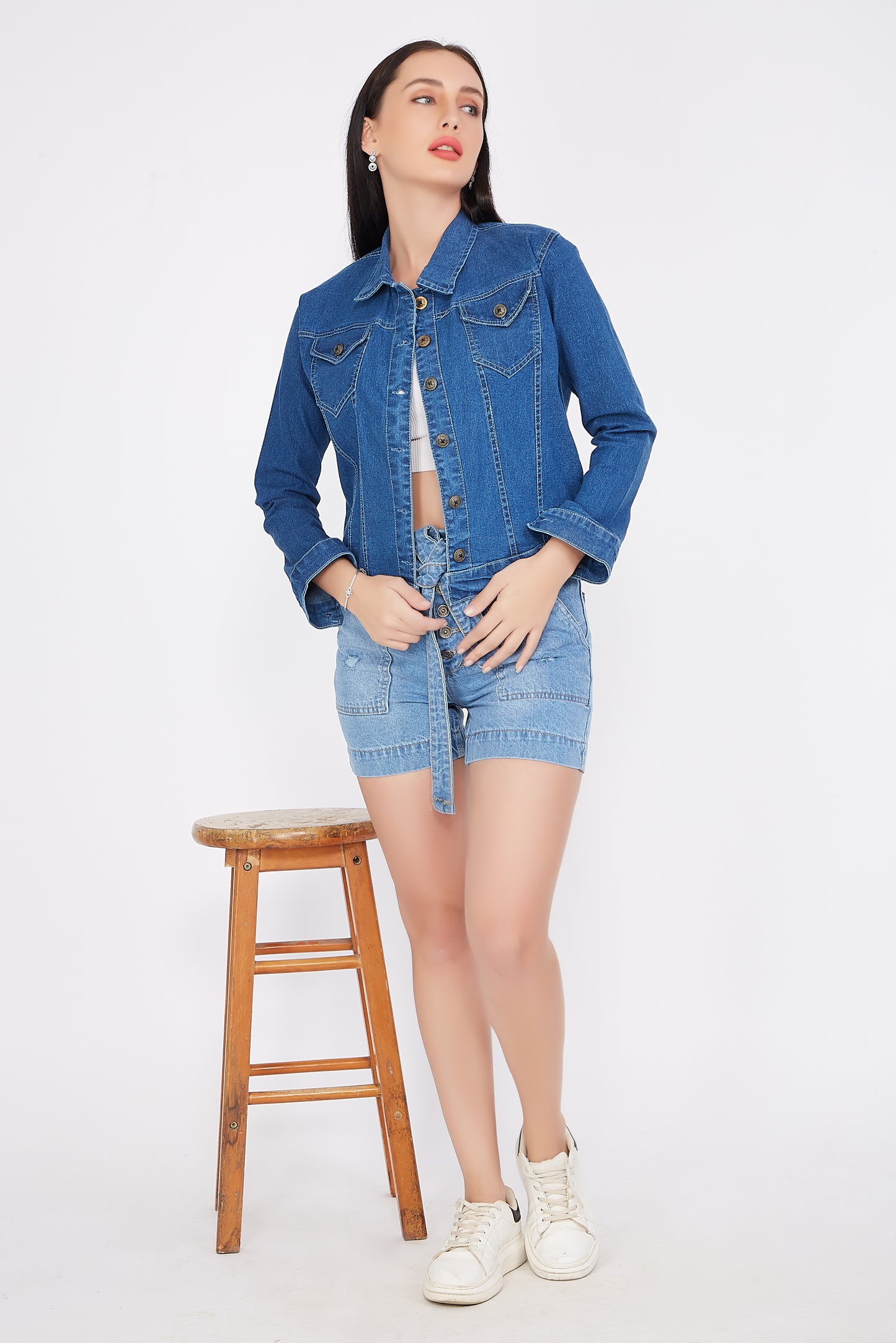 Full casual view of a model wearing Cefalu®️ Solid Blue Denim Jacket for Women, showing the complete look with full sleeves and stand collar