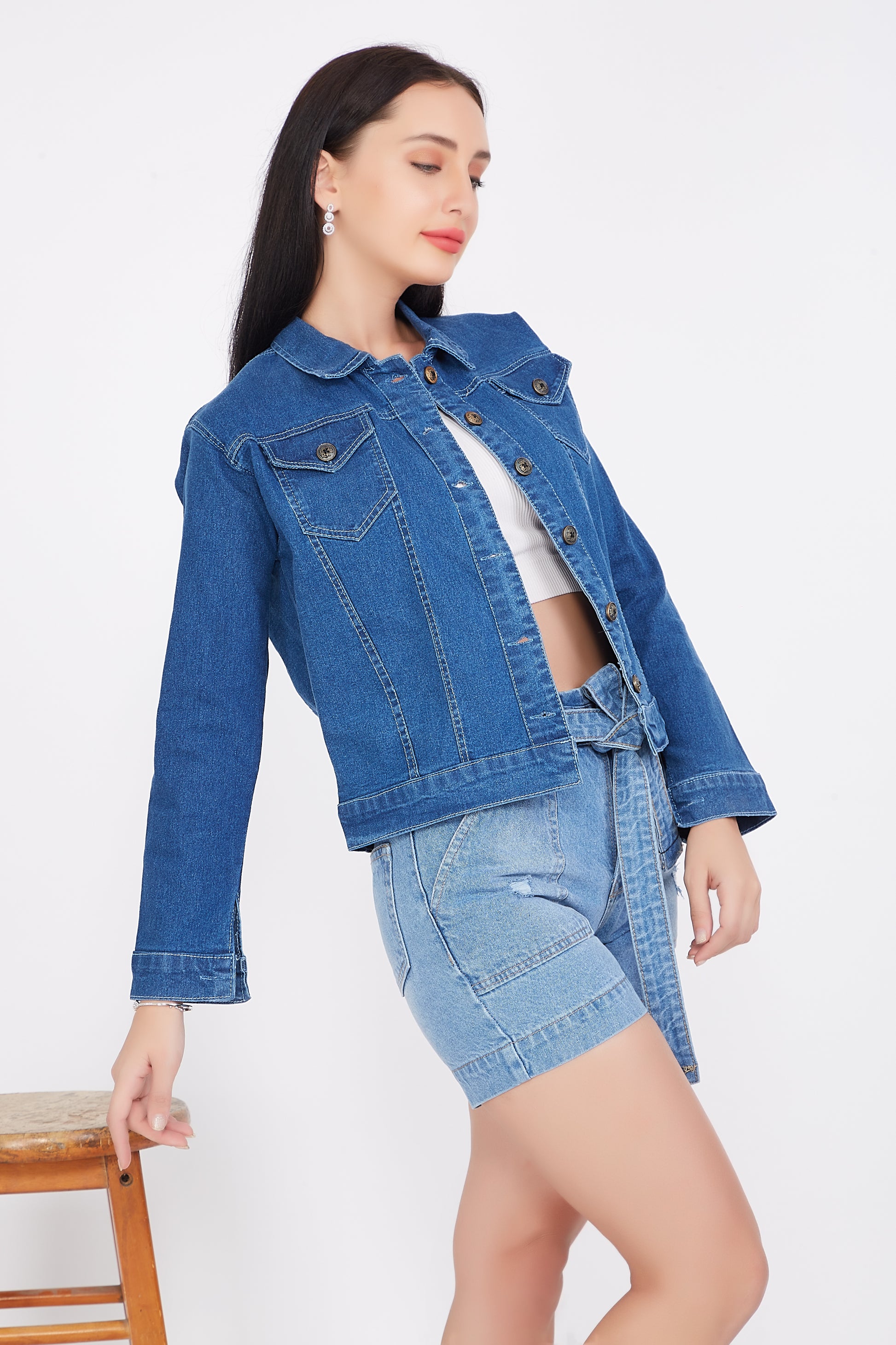 Right side view of a model wearing Cefalu®️ Women’s Solid Blue Denim Jacket, displaying the jacket’s fit and design