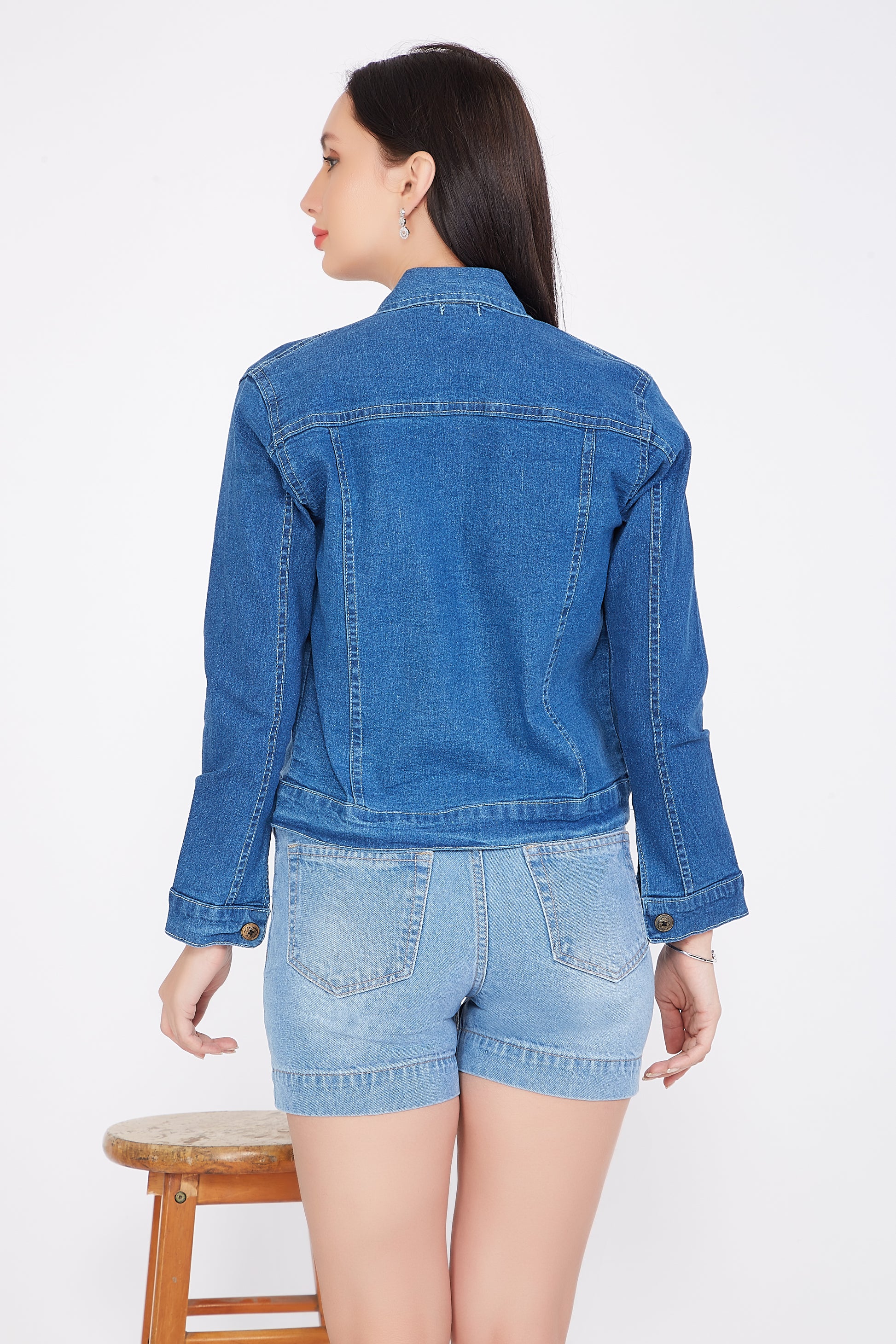 Back view of Cefalu®️ Women’s Blue Denim Jacket, highlighting the clean lines and solid blue color.