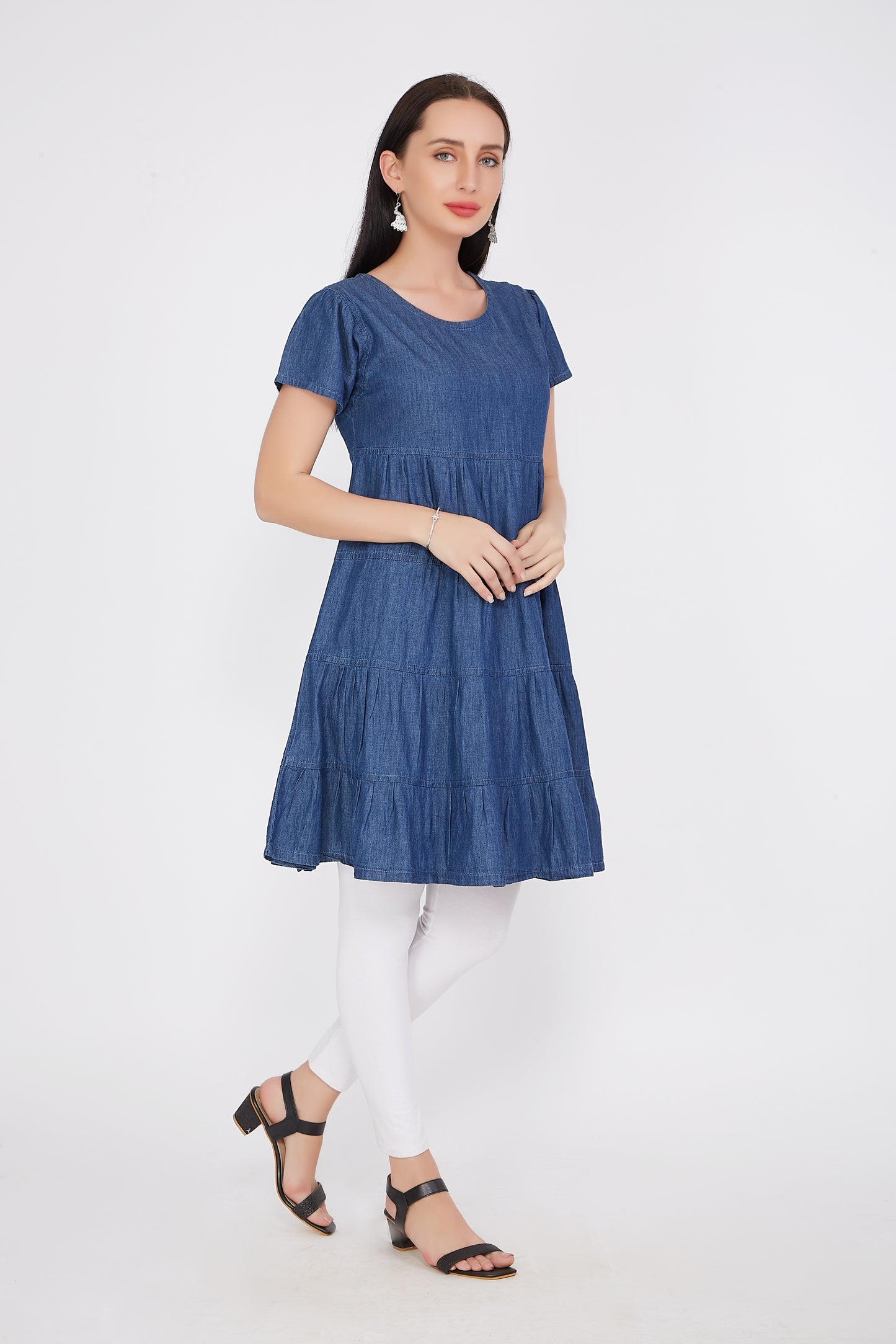 Side view of Cefalu®️ Women’s Dark Blue A-Line Denim Dress, showcasing the knee length, A-line shape, and puffed sleeves.