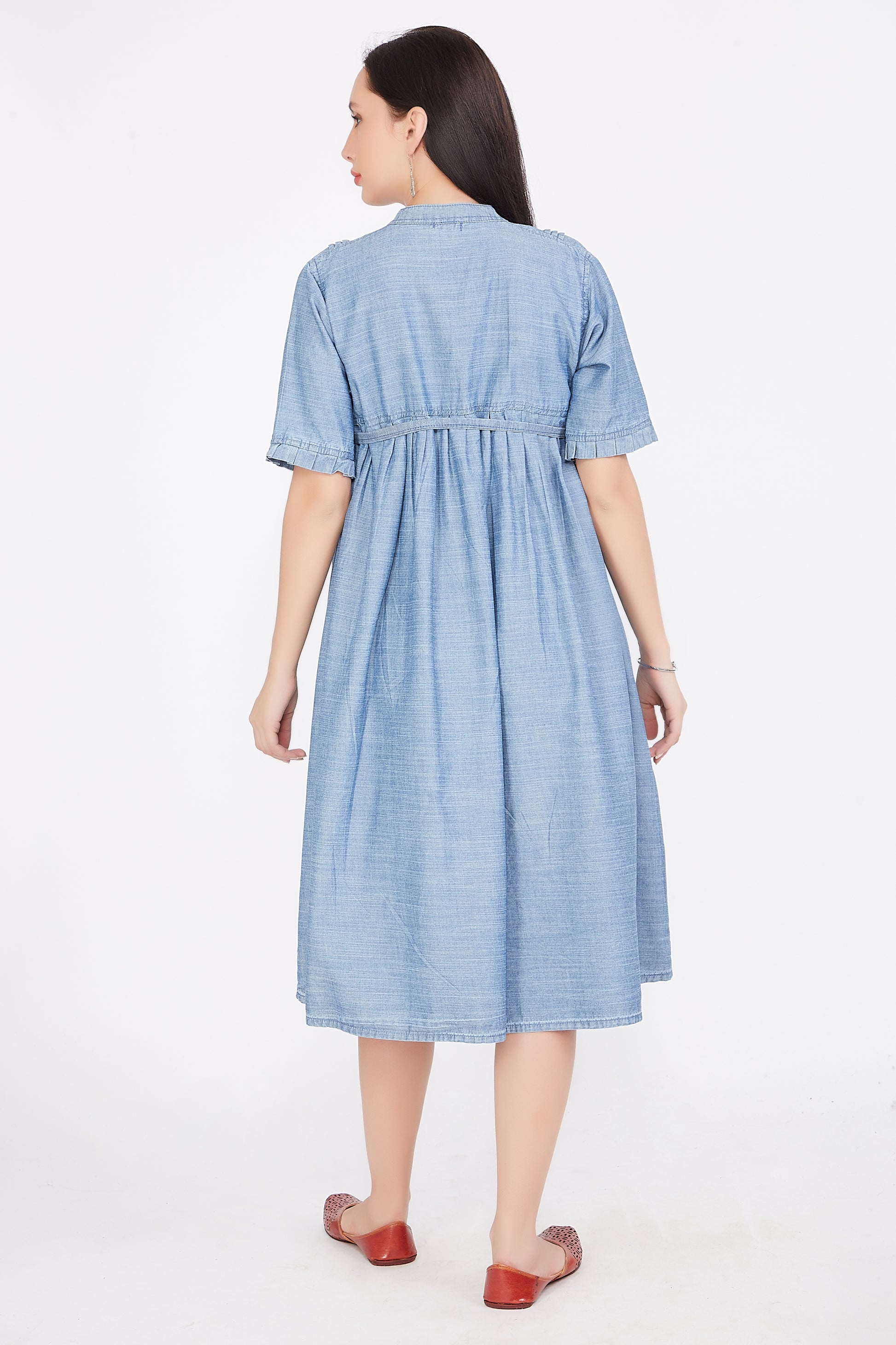 Back view of Cefalu®️ Women’s Light Blue Maternity Dress, showing the full buttoned design and fair & flare silhouette.