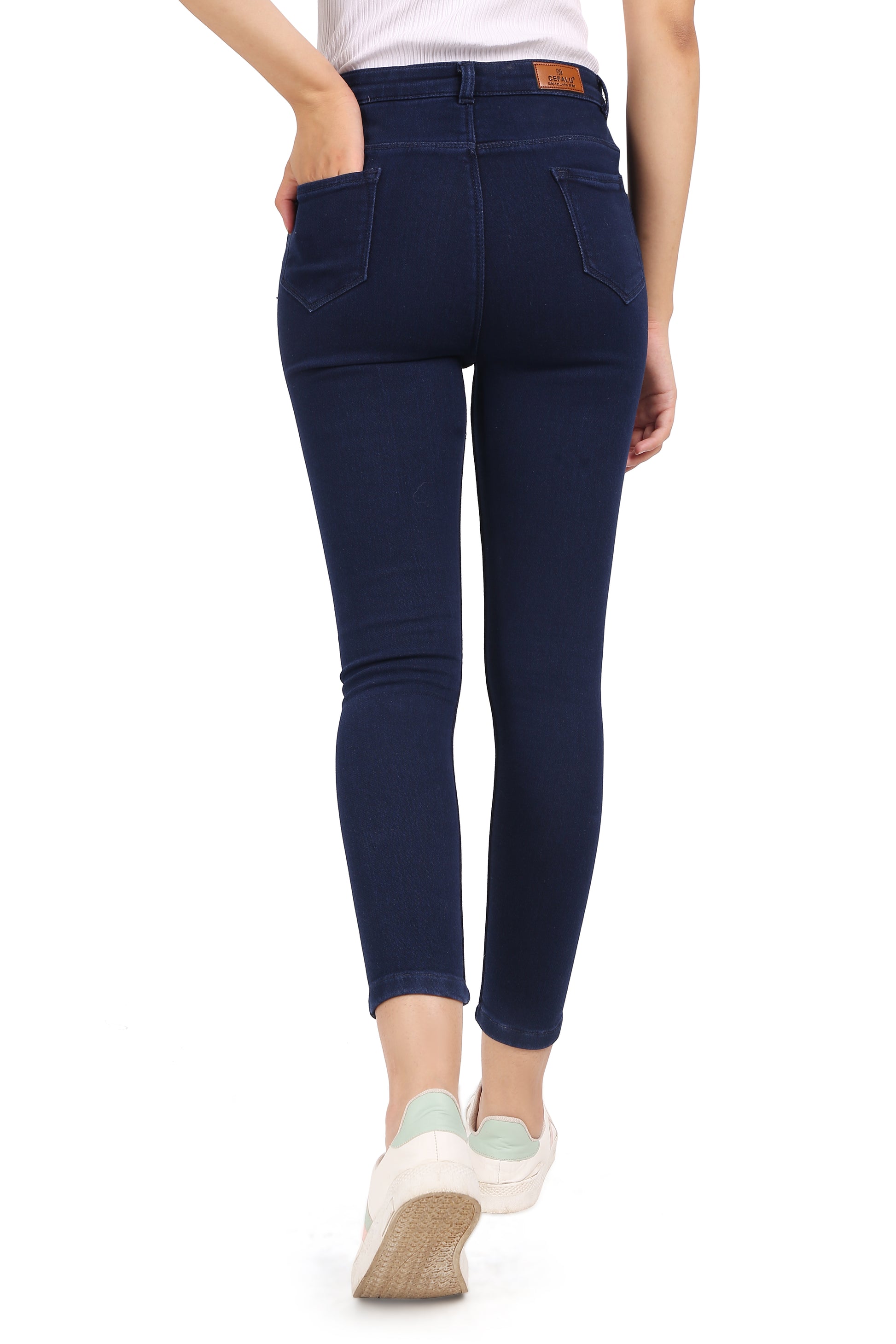 Back view of Cefalu®️ Women’s Dark Blue Skinny Jeans, featuring the deep dark blue color and the simple, elegant design.