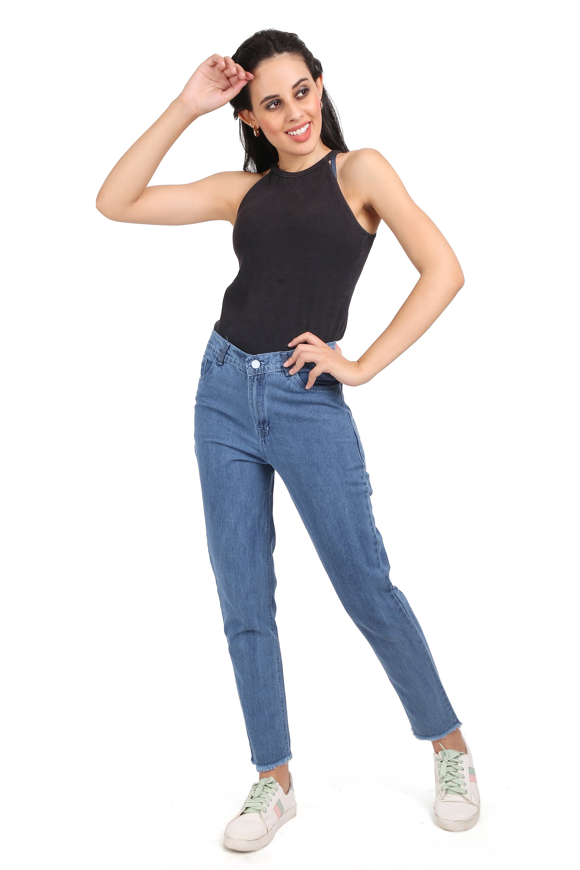 Full model view of Cefalu Women’s High-Rise Relaxed Fit Cotton Denim Ankle-Length Slim Fit Jeans, styled with a chic top and shoes. The model demonstrates the versatile and sophisticated look of these comfortable jeans.