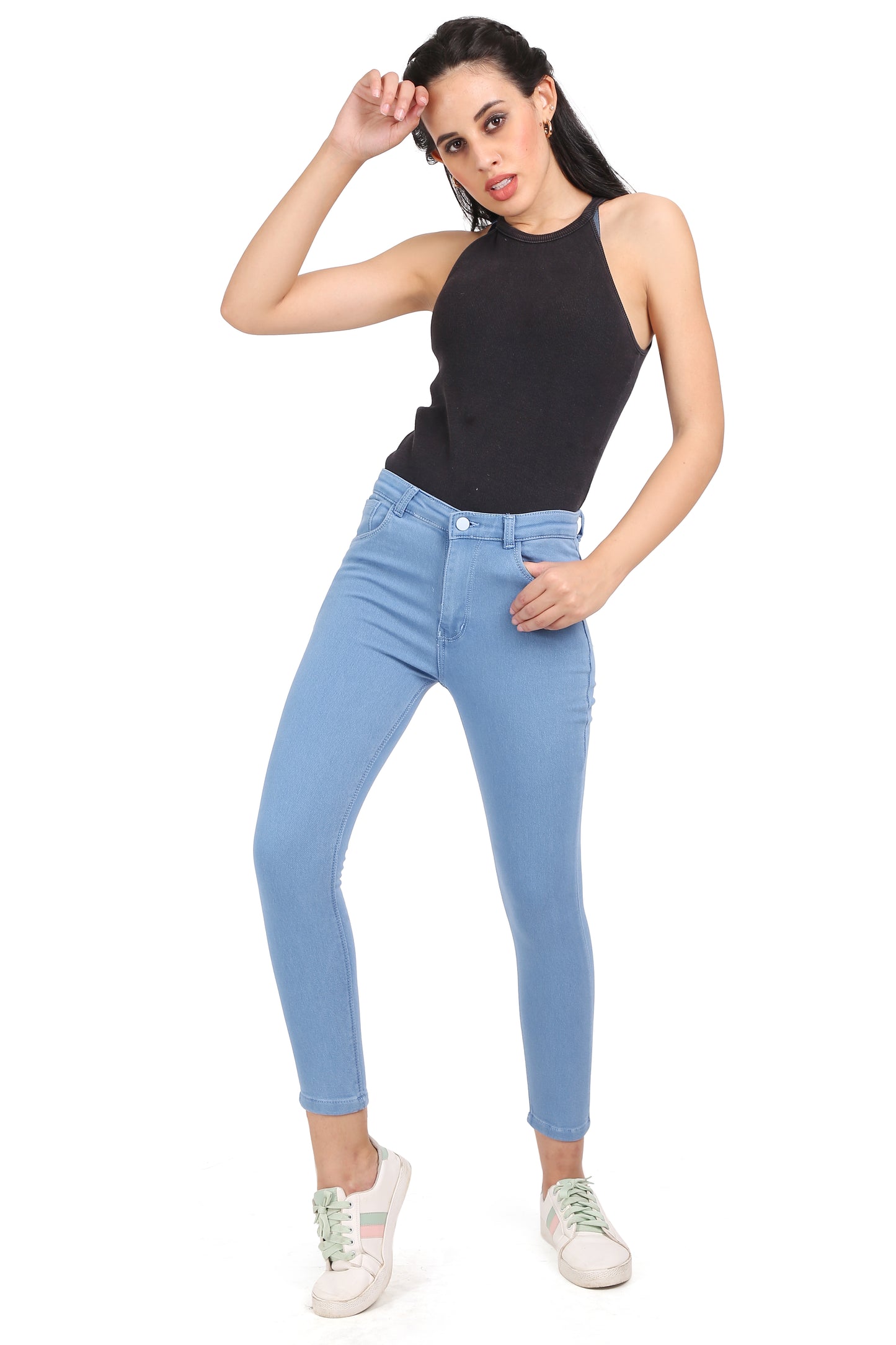 Full-length view of a model wearing Cefalu®️ Women’s Light Blue Skinny Jeans, showcasing the flattering fit and trendy design from top to bottom.