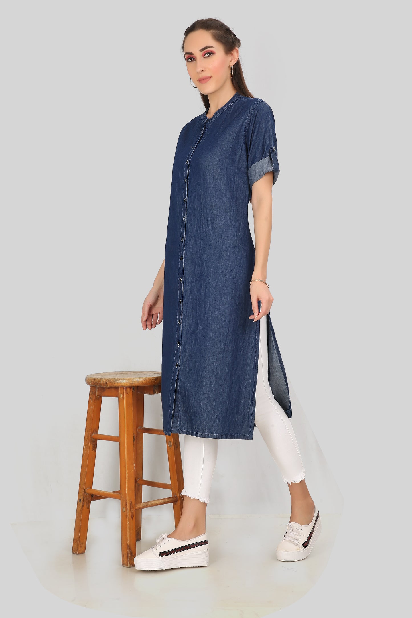 Left side view of Cefalu Women’s Dark Blue Denim Kurti, emphasizing the 3/4th sleeves with lupi and the clean side profile.