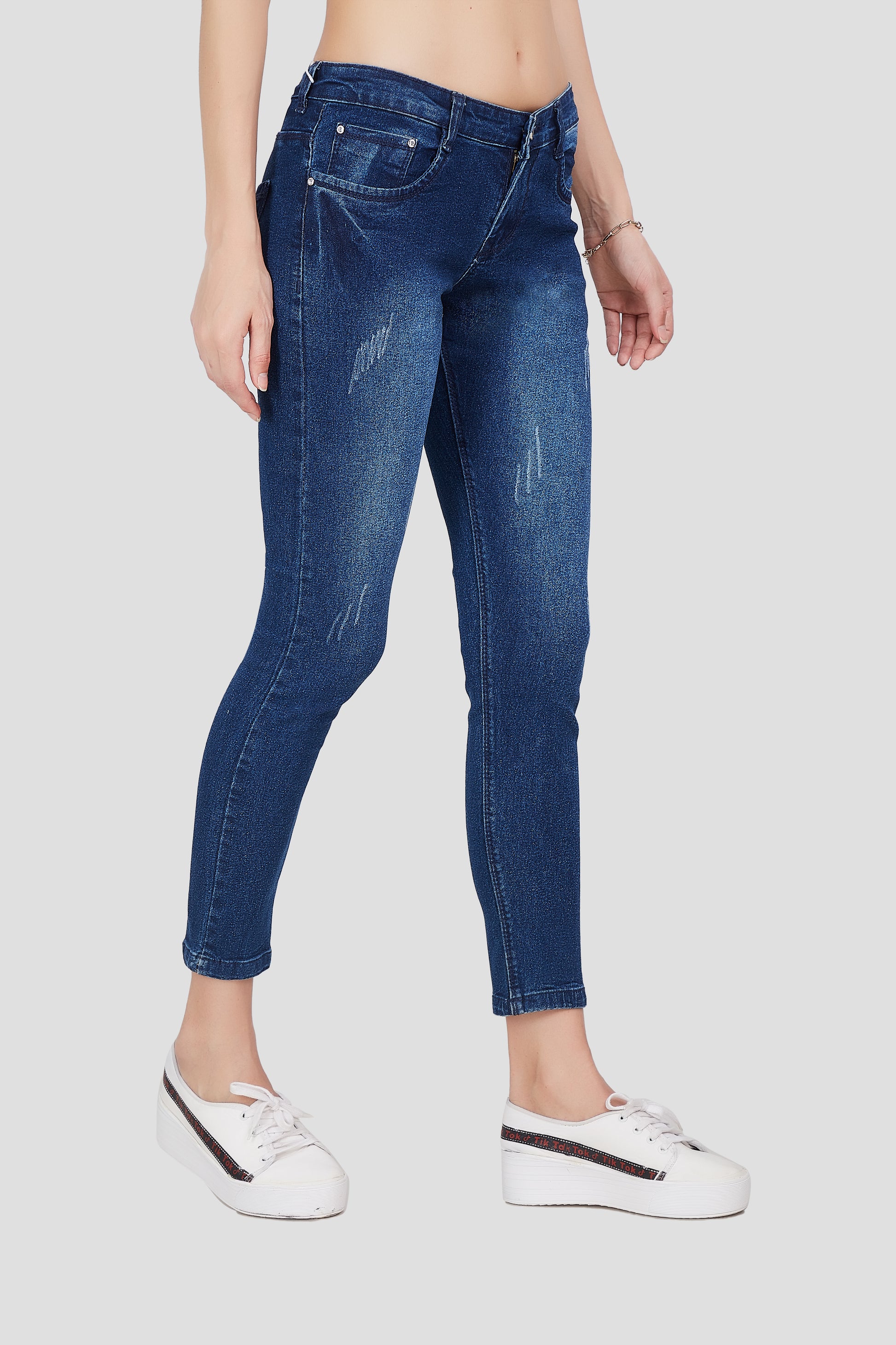 Right side view of Cefalu®️ Women’s Mid Blue Skinny Fit Jeans, showcasing the comfortable fit and light wash.