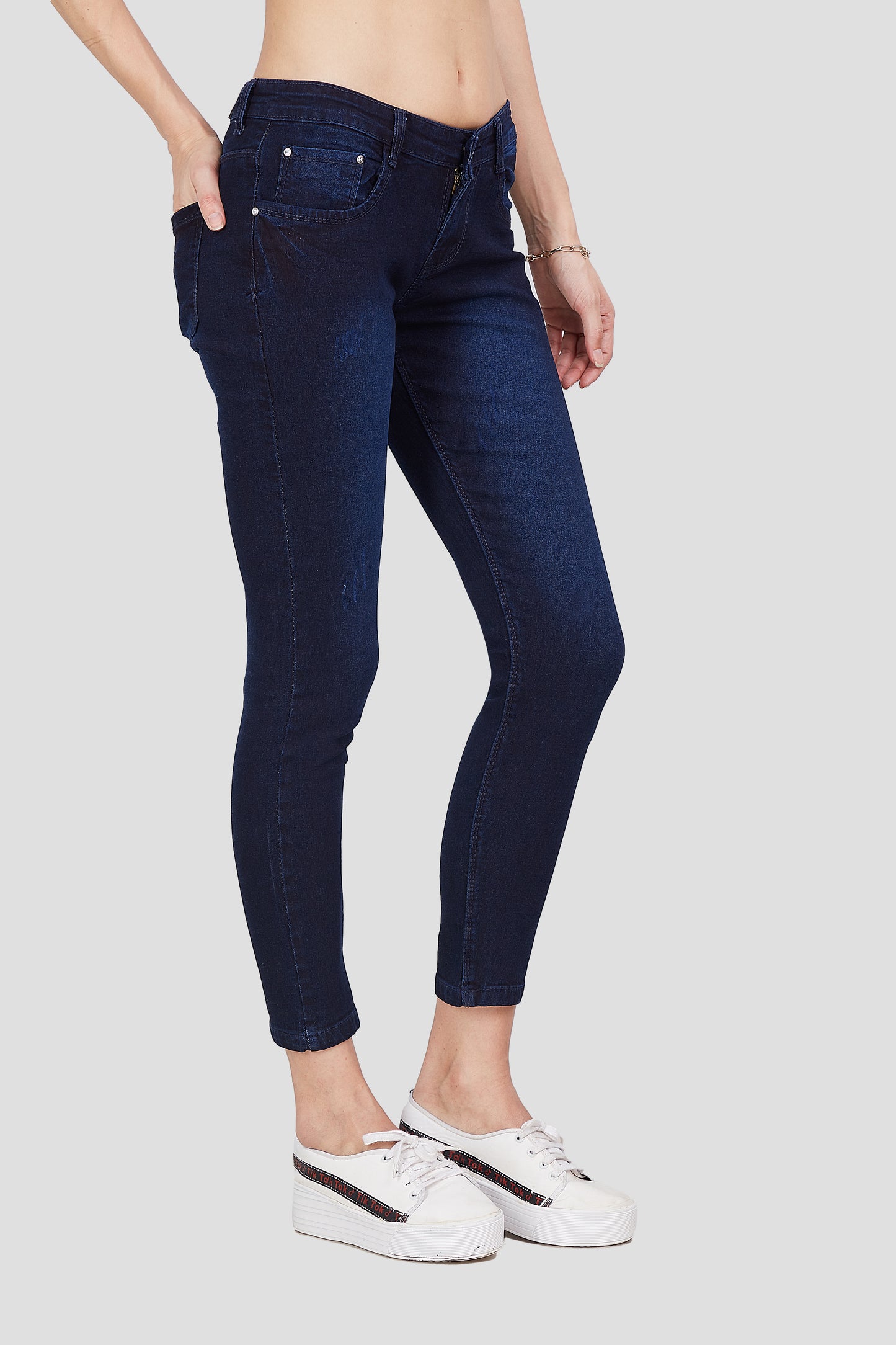 Right side view of Cefalu®️ Women’s Dark Blue Skinny Fit Jeans, showcasing the comfortable fit and light wash.