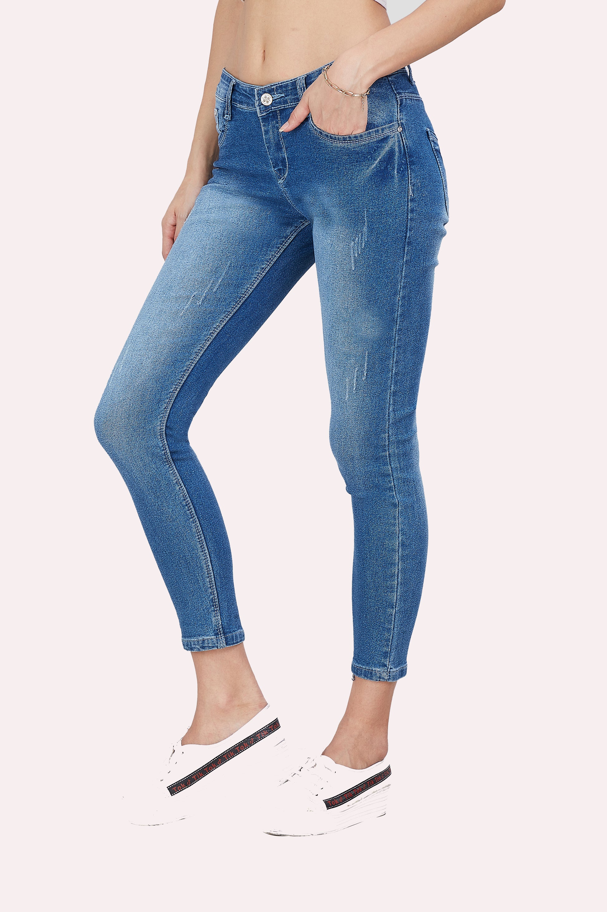 Left side view of Cefalu®️ Women’s Light Blue Slim Fit Jeans, emphasizing the slim fit and light fade wash.