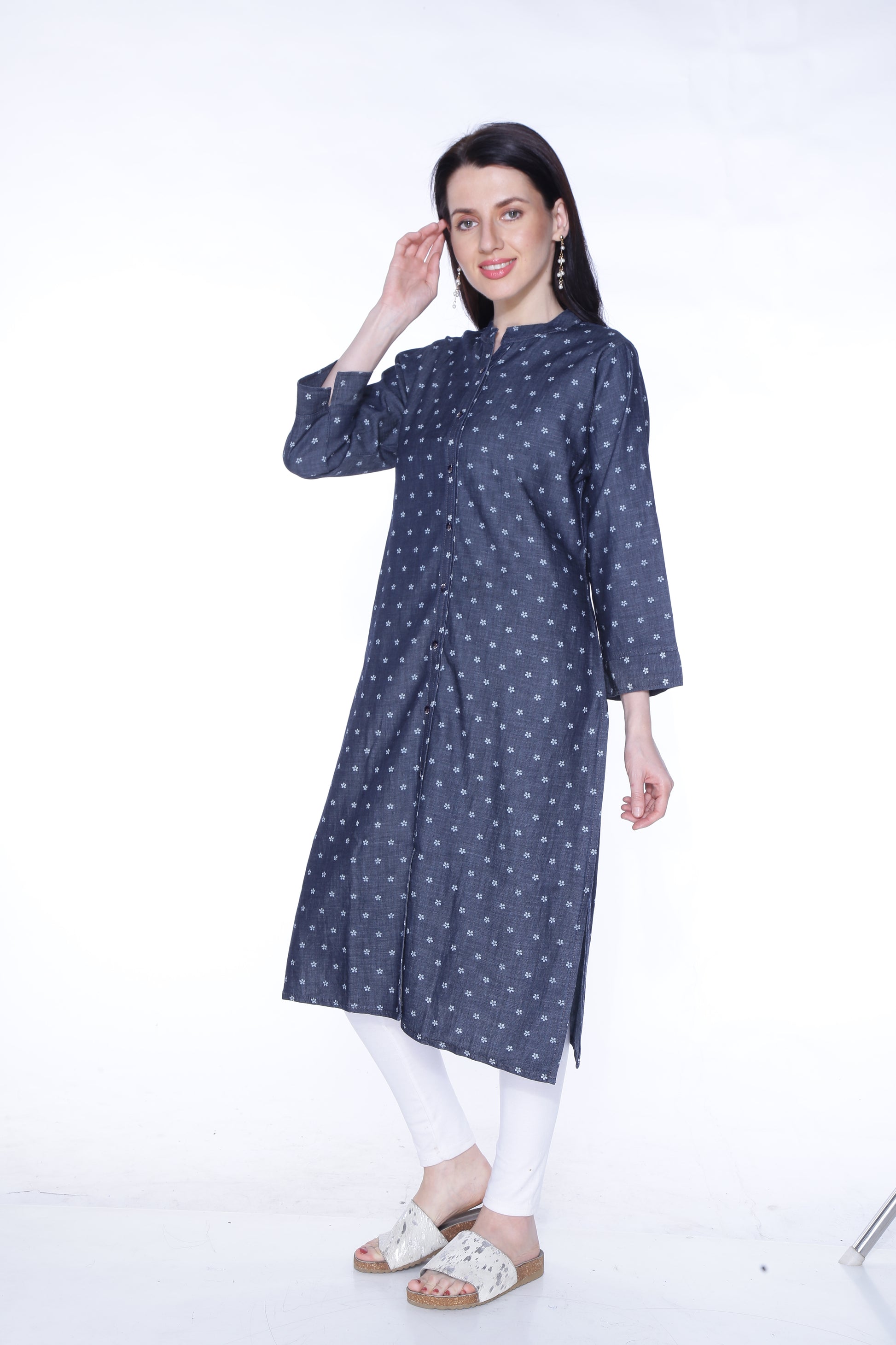 Side view of Cefalu®️ Women's Blackish Blue Polka Print Denim Kurti, emphasizing the 3/4 sleeves and overall fit.