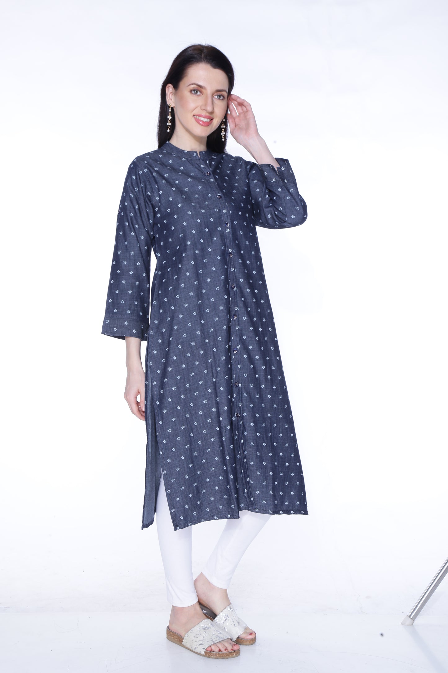 Side view of Cefalu®️ Women's Blackish Blue Polka Print Denim Kurti, emphasizing the 3/4 sleeves and overall fit.