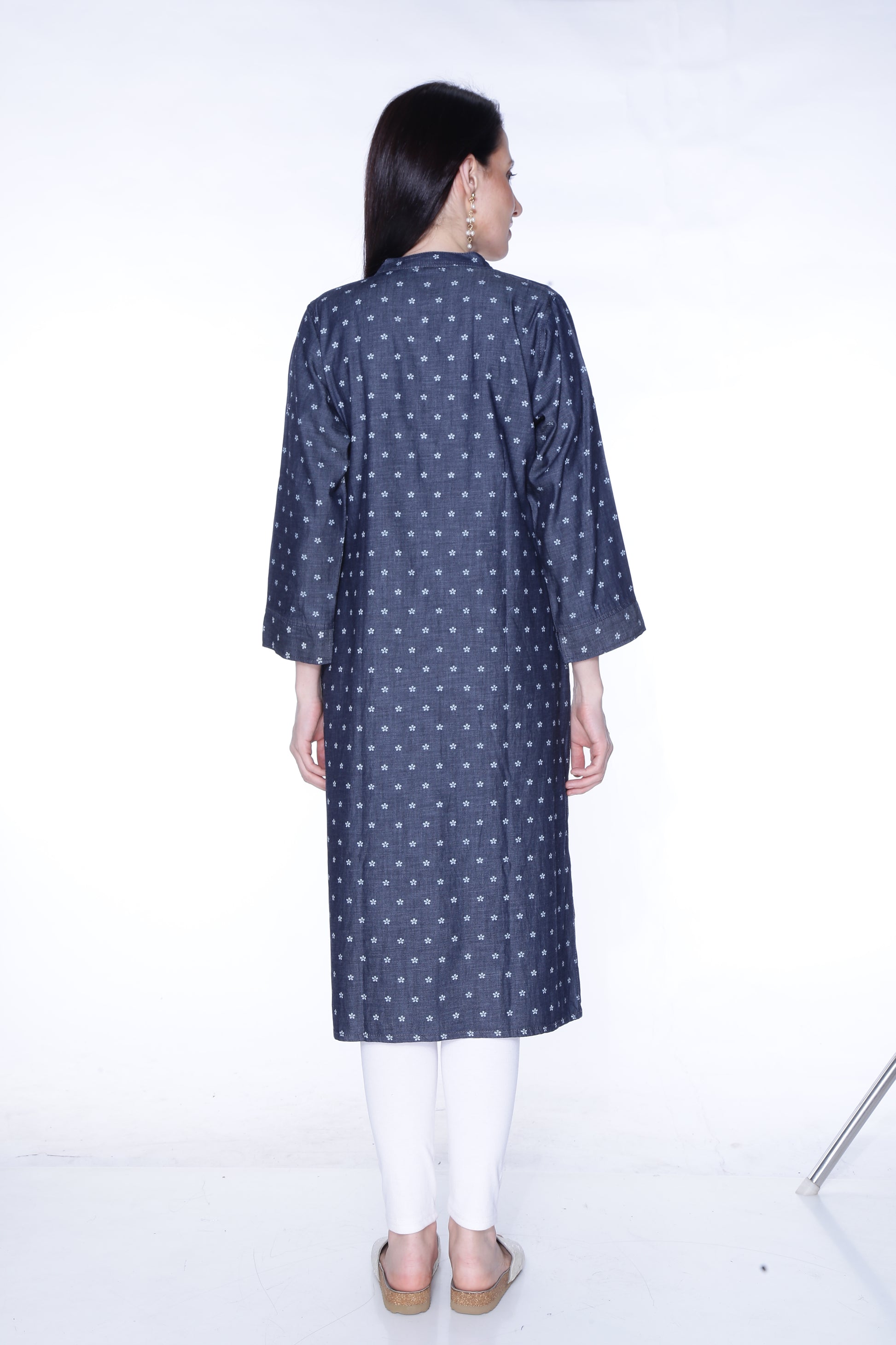 Back view of Cefalu®️ Women's Blackish Blue Polka Print Denim Kurti, showing the below-knee length and straight cut.