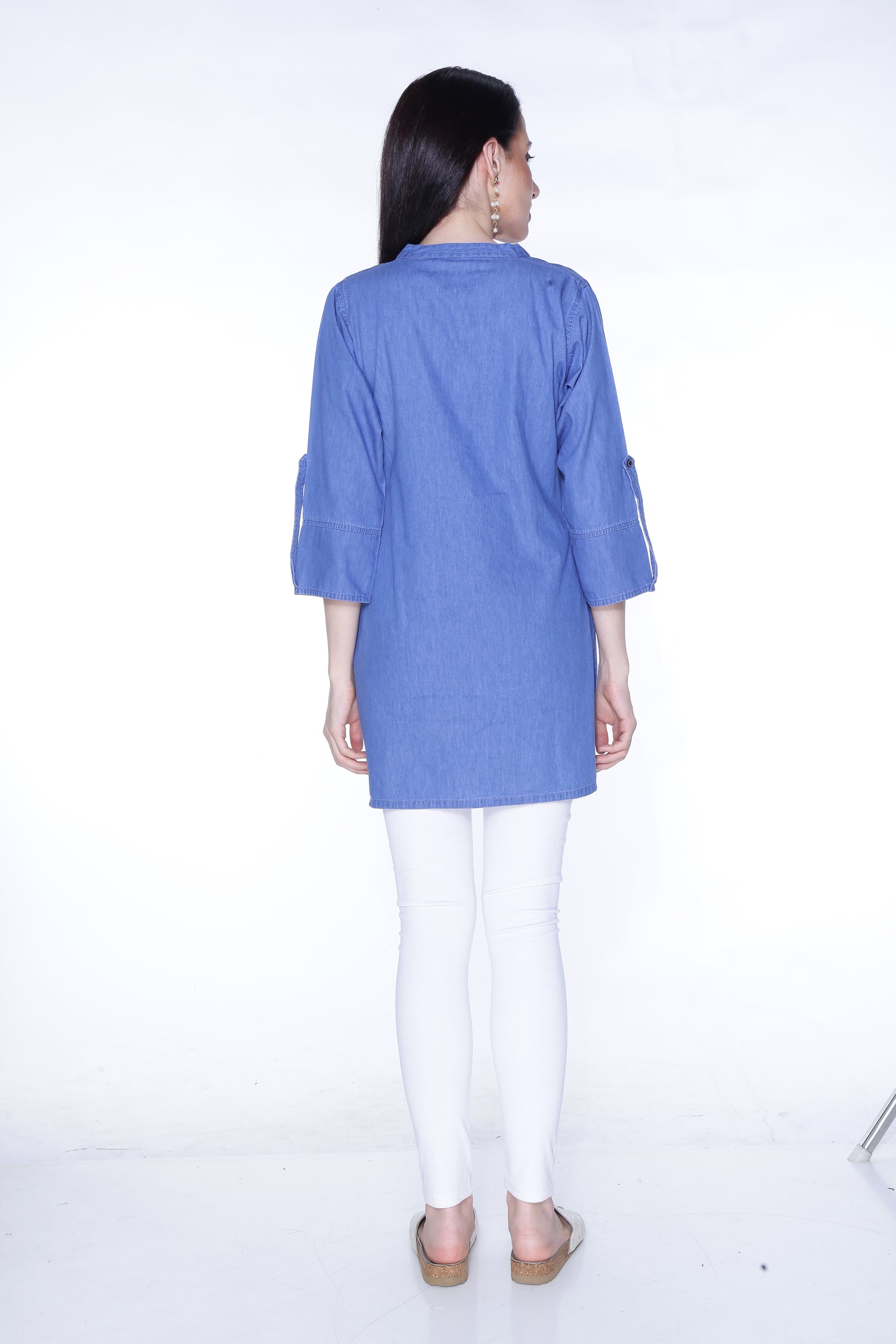 Back view of Cefalu®️ Women's Light Blue Denim Kurti, showing the straight cut and hip-length design.