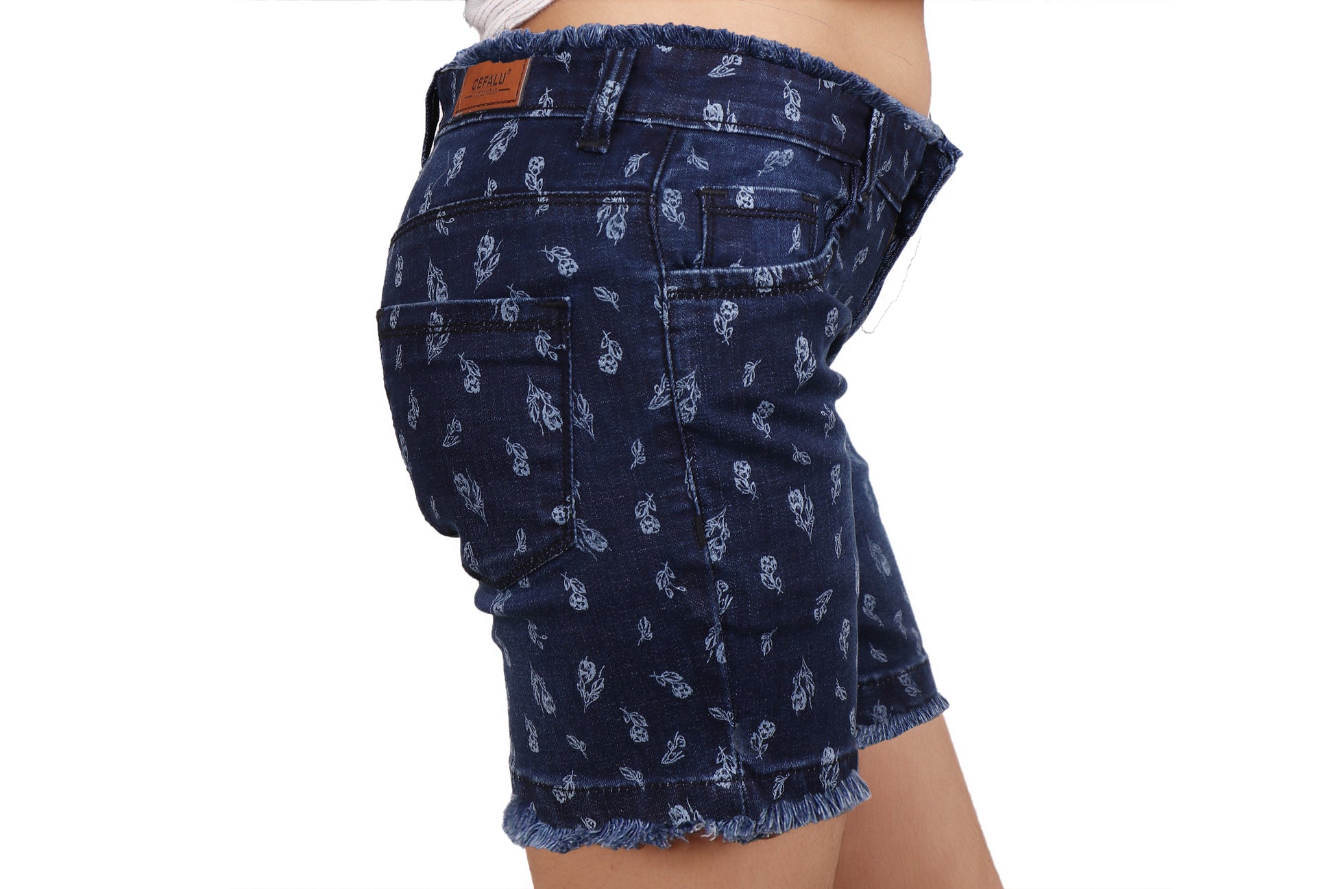 Left side view of Cefalu®️ Women’s Dark Blue Denim Shorts, emphasizing the skinny fit and mid-rise waist.