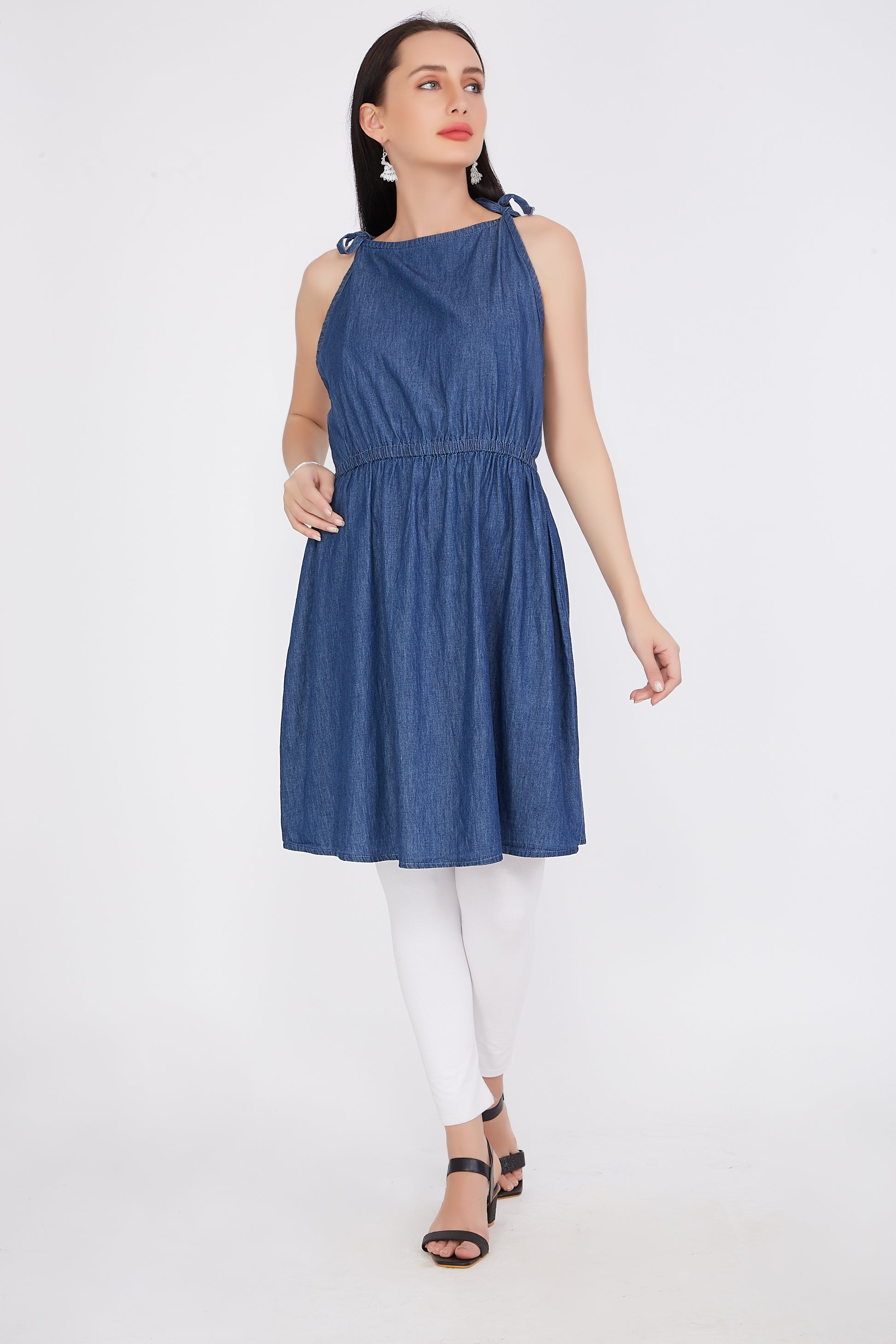 Front view of Cefalu®️ Women’s Fit and Flare Blue Denim Dress featuring knee length, noodle straps, and a solid blue design.