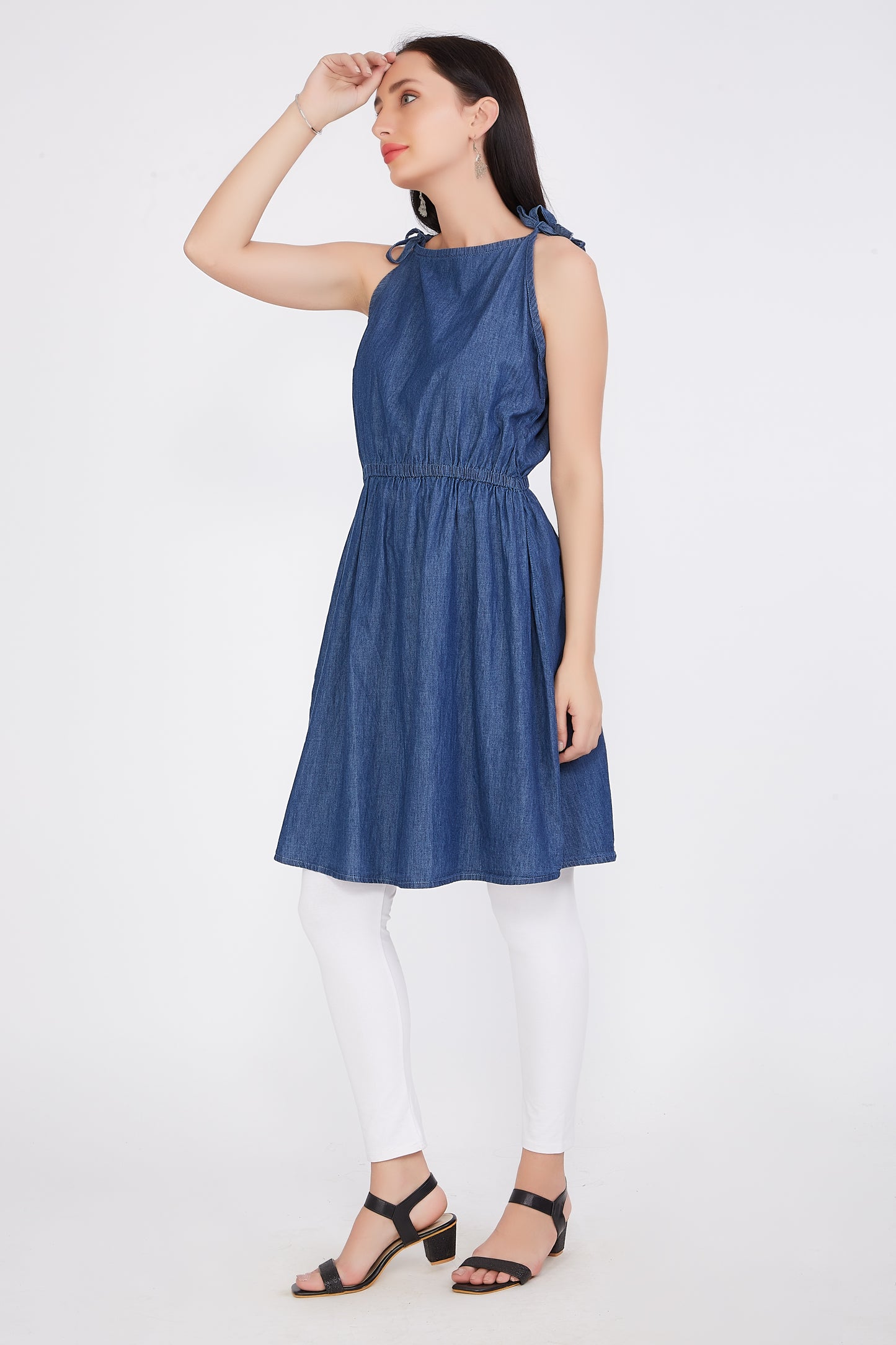 Side view of Cefalu®️ Women’s Fit and Flare Blue Denim Dress, showcasing the flattering fit-and-flare design and knee length.