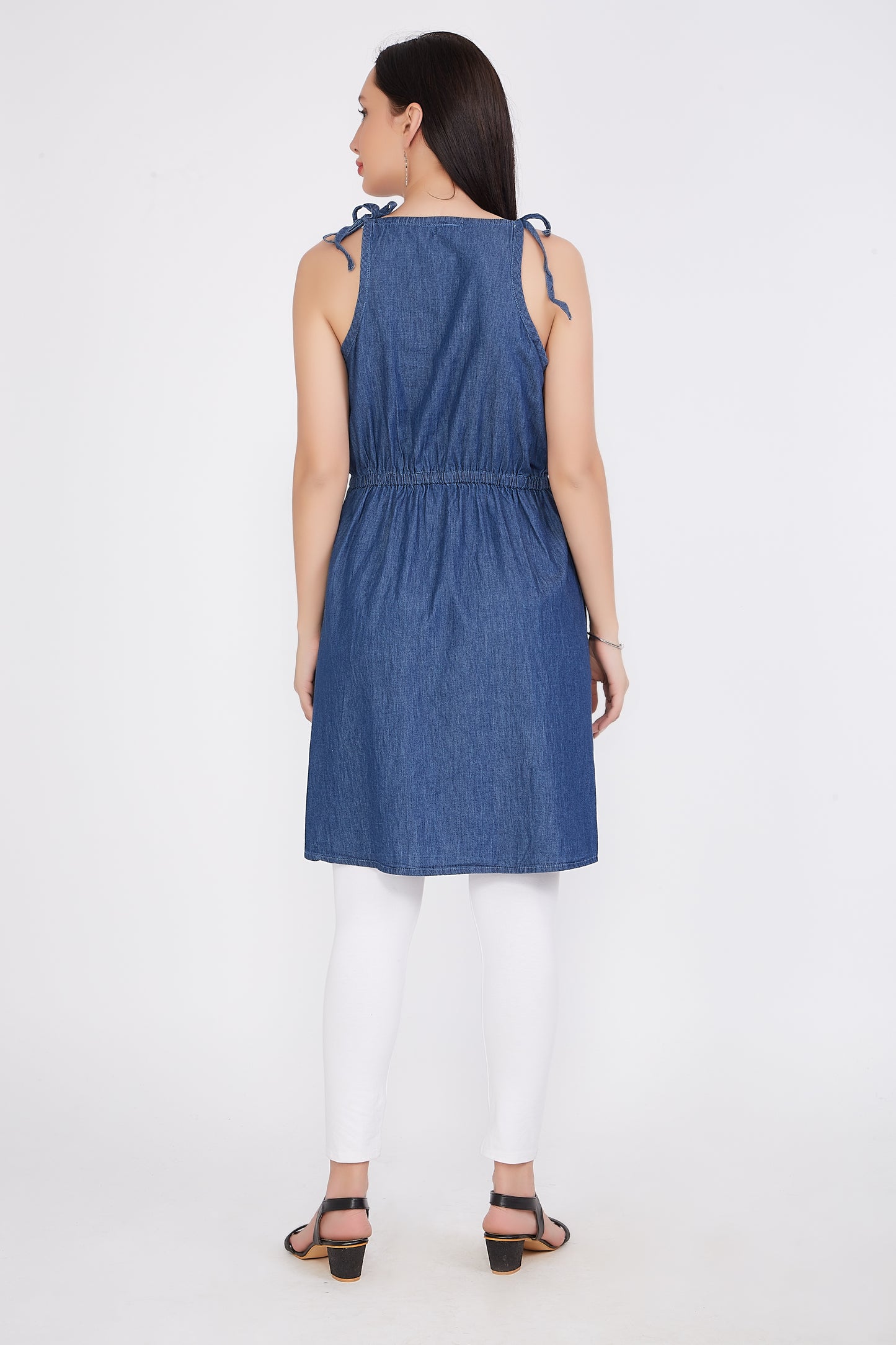 Back view of Cefalu®️ Women’s Fit and Flare Blue Denim Dress showcasing the knee length and overall fit-and-flare silhouette.