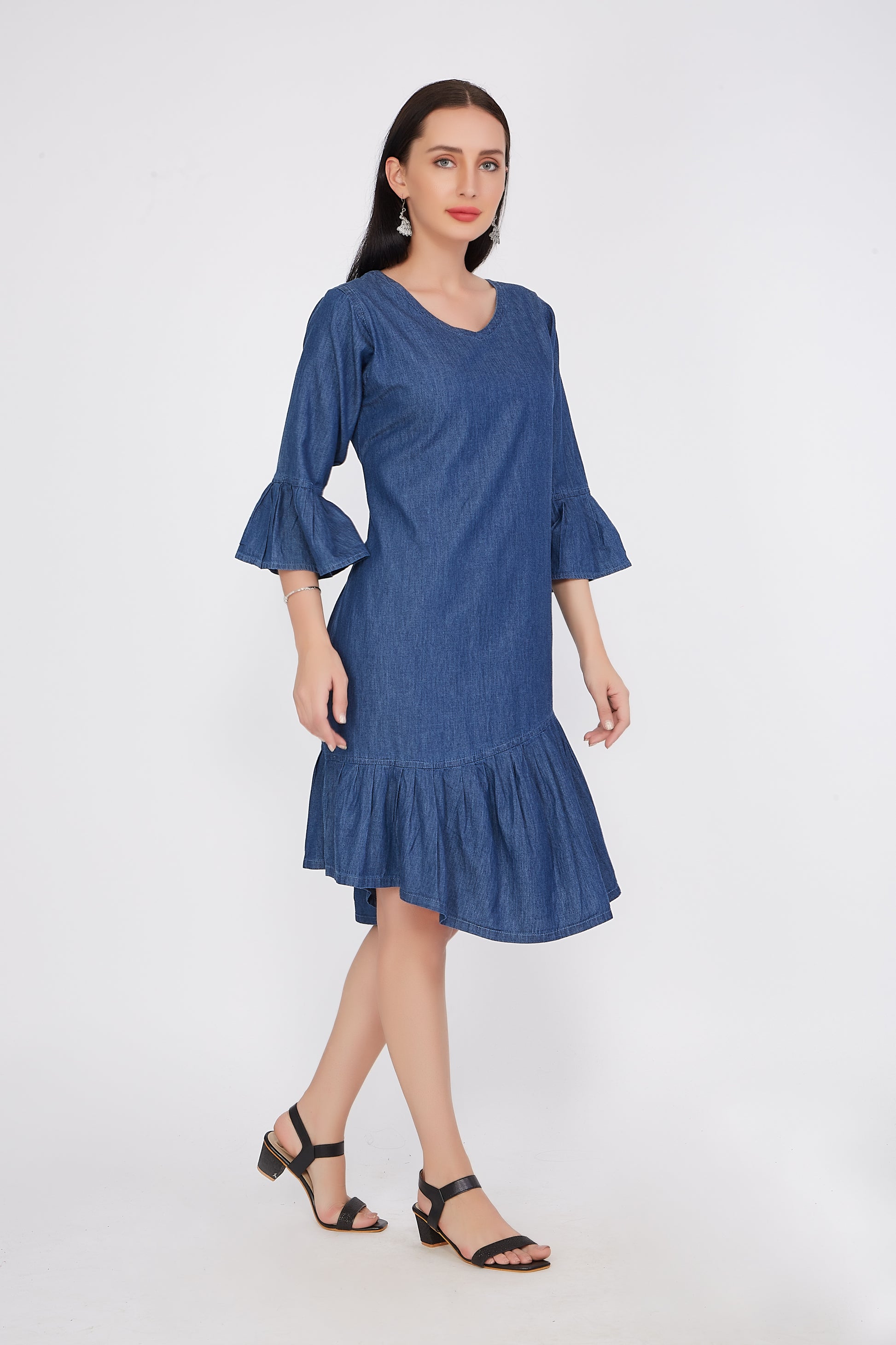 Side view of Cefalu®️ Women’s A-Line Blue Denim Dress, showcasing the knee length and bell sleeves.