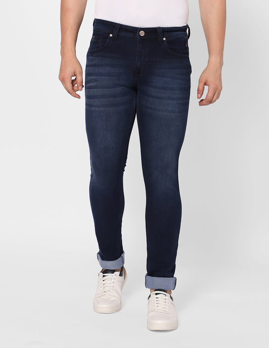 Front view of TCI Men’s Dark Indigo Jeans, showcasing the sleek slim fit and clean design.