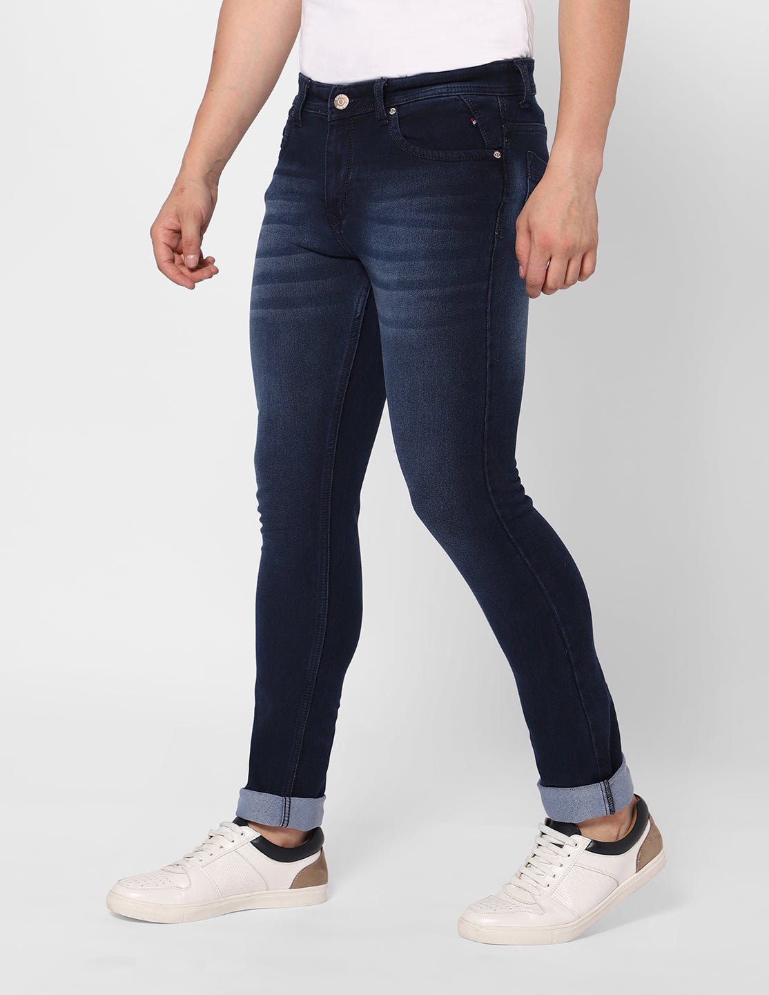 Side view of TCI Men’s Dark Indigo Jeans, displaying the slim fit and smooth denim texture.