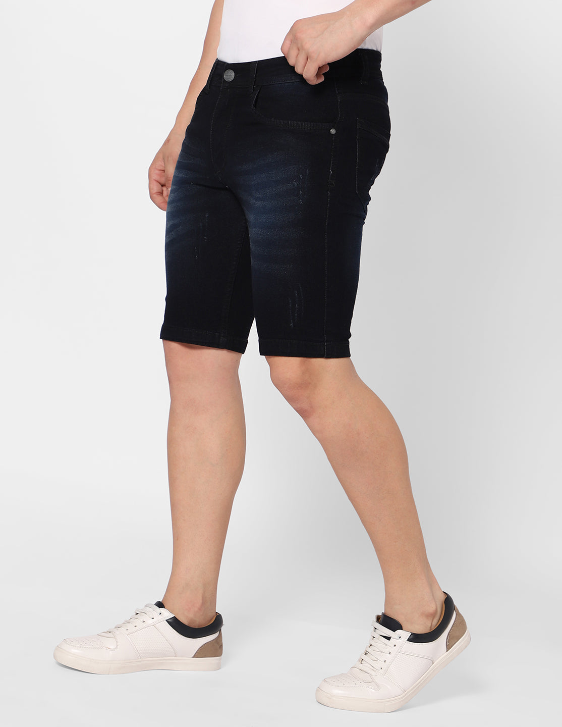 Side view of TCI Men’s Black Denim Shorts highlighting the mid-rise cut and comfortable fit.