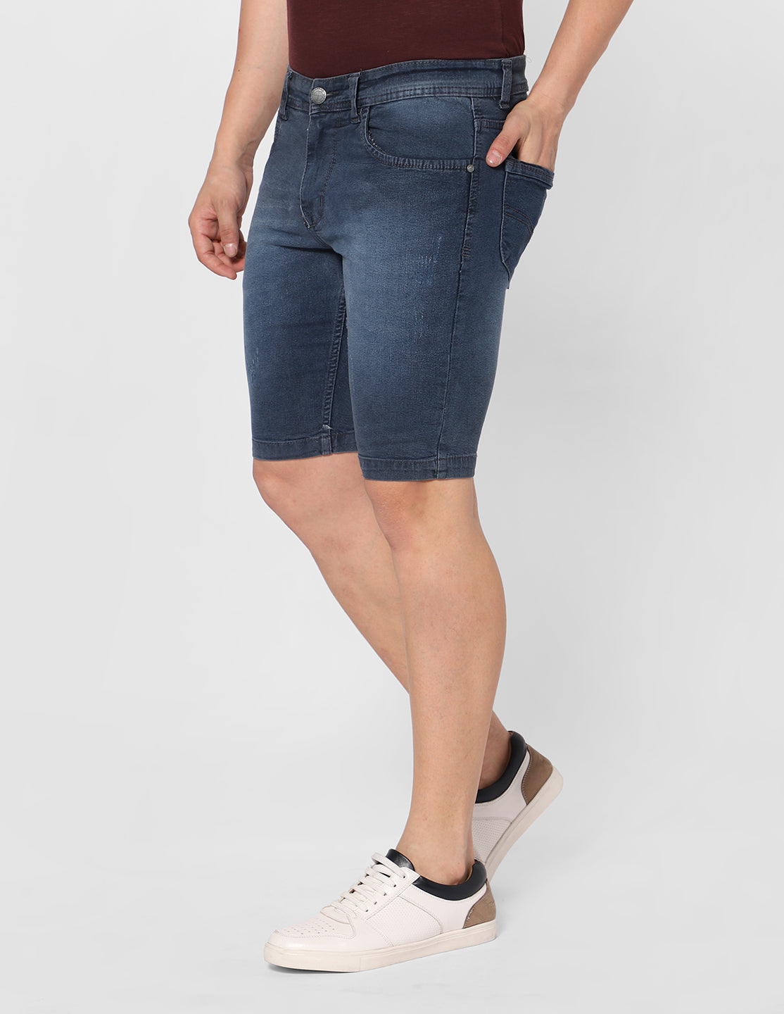 Side view of TCI Men's Greyish Blue Denim Shorts, demonstrating the mid-rise fit and overall silhouette.