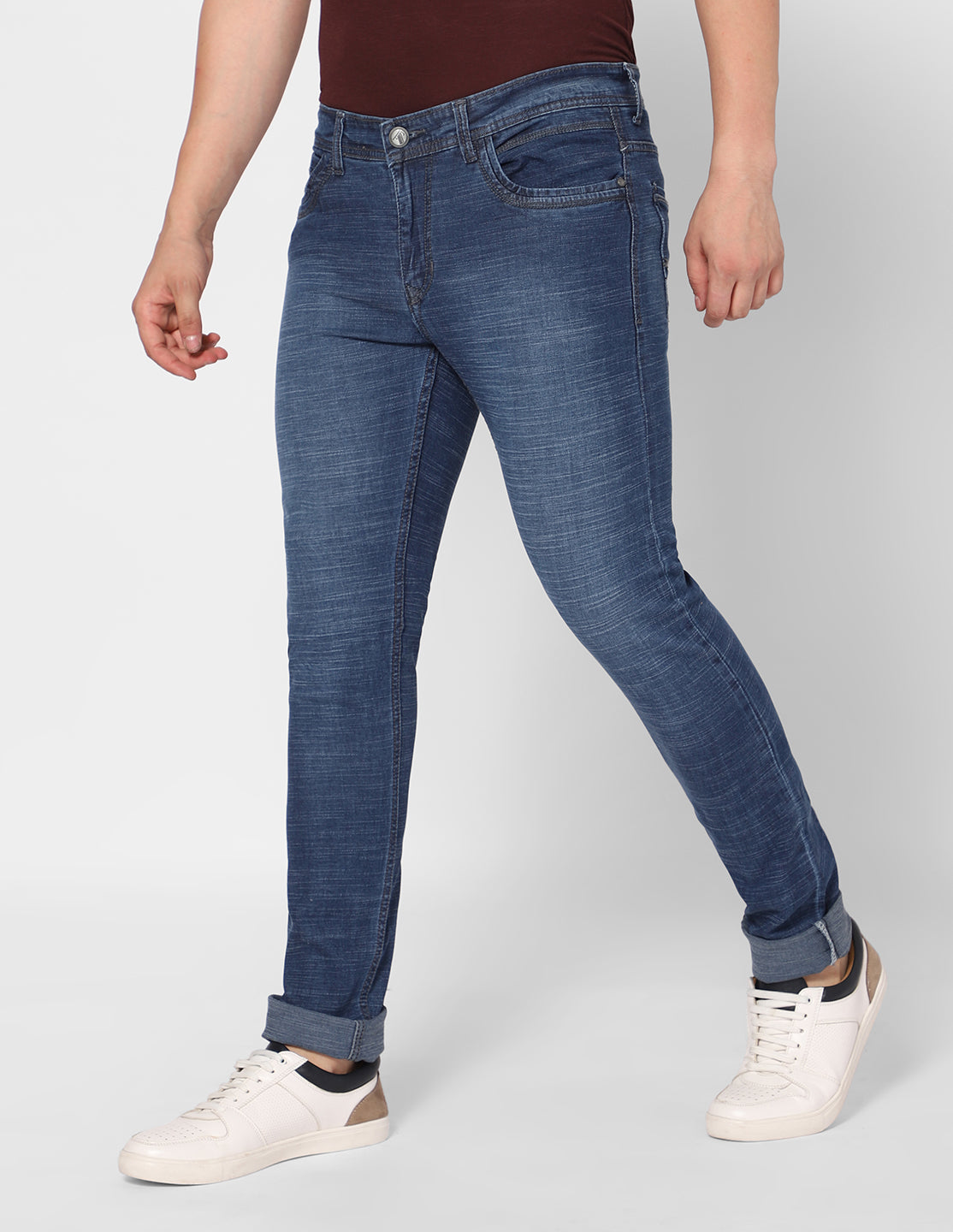 Side view of TCI Men's Stretchable Dark Blue Denim Jeans highlighting the sleek, tailored profile.