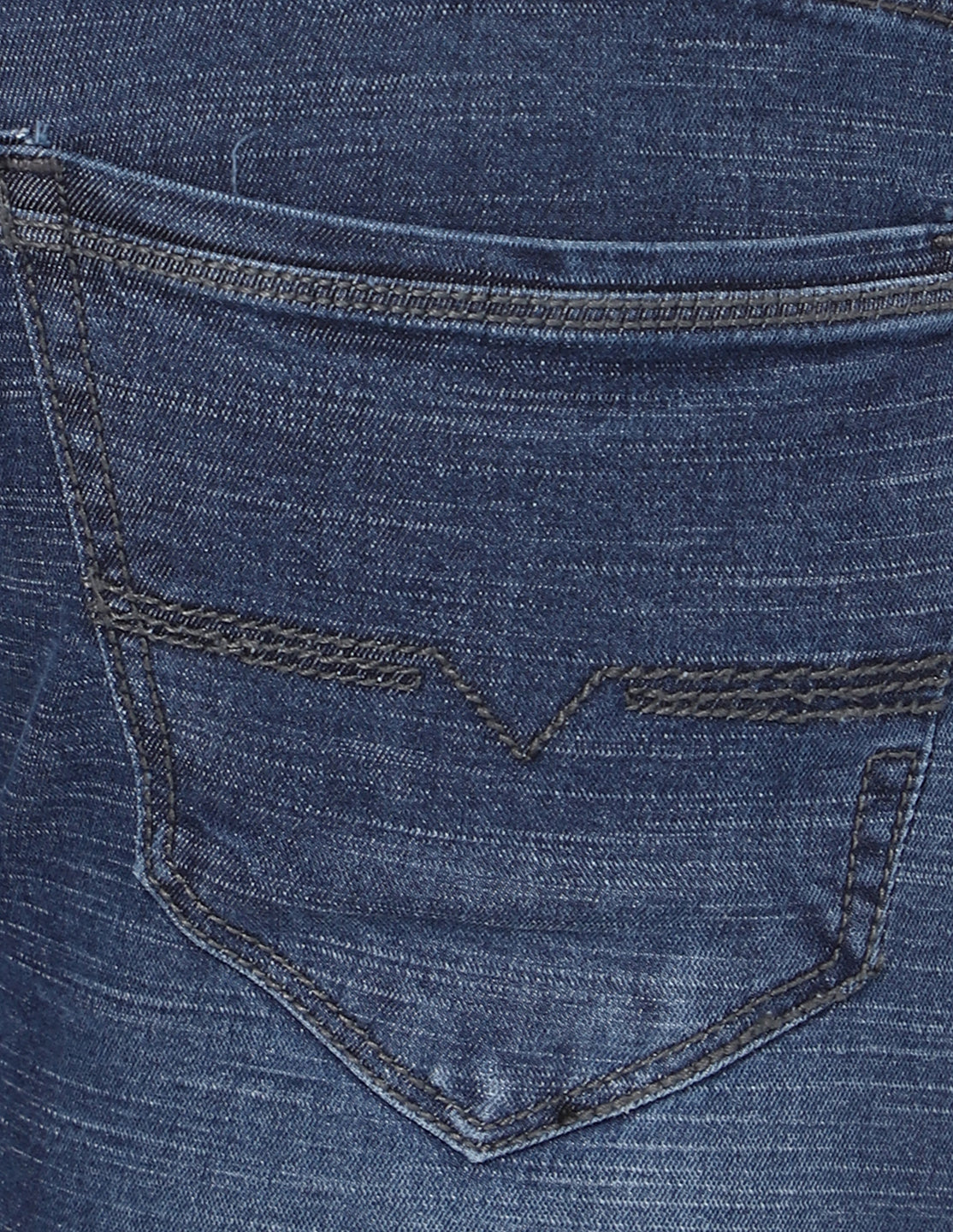 Close-up of the back pocket on TCI Men's Stretchable Dark Blue Denim Jeans, emphasizing quality stitching and design details.