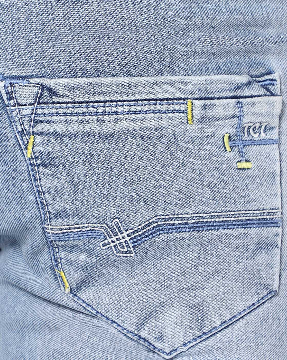 Close-up of the stretchable denim fabric of TCI Light Blue Jeans, highlighting the quality and texture of the material.