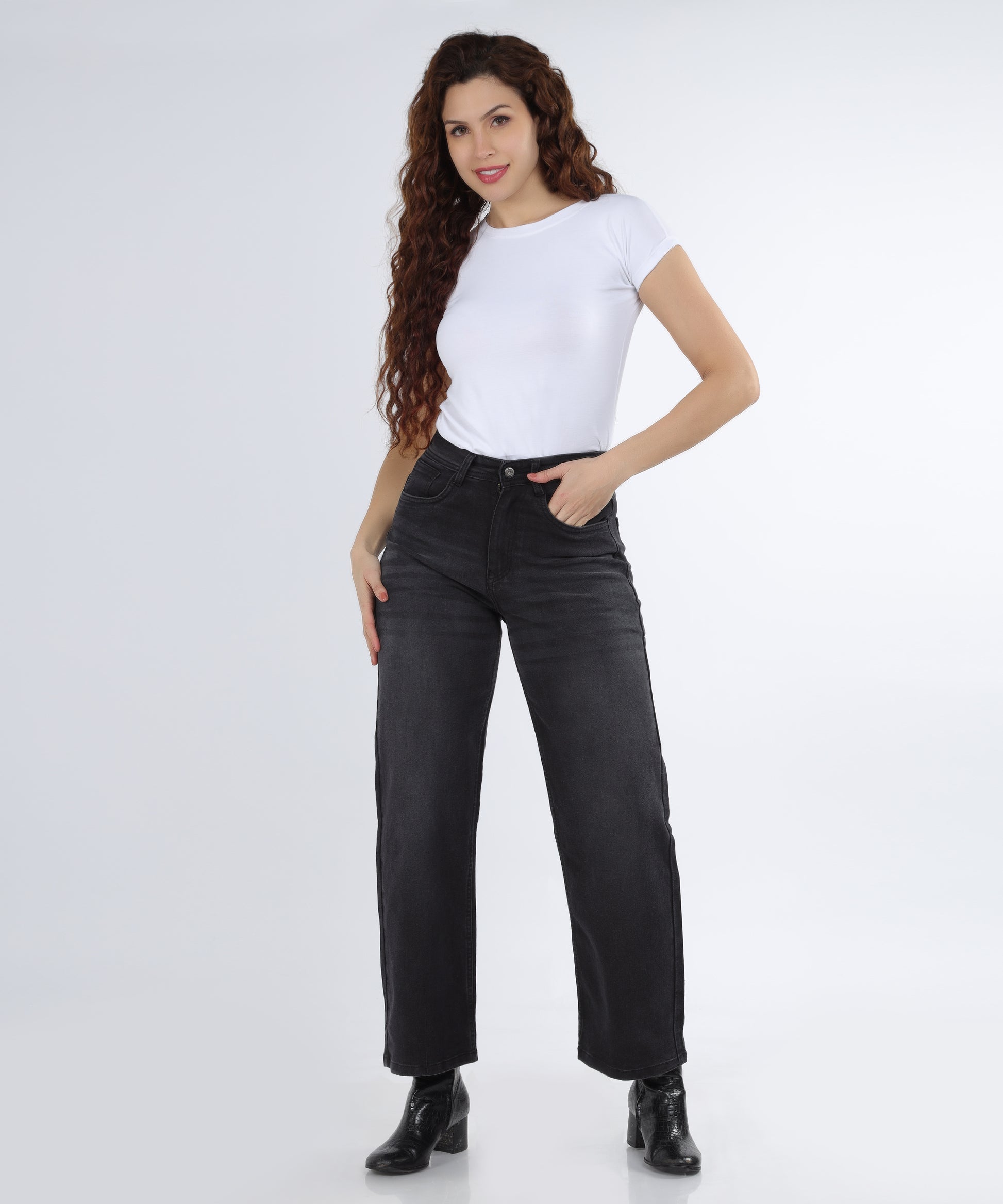 Model showcasing Cefalu Women’s Relaxed Fit Wide Leg Black Jeans, styled for a casual look.