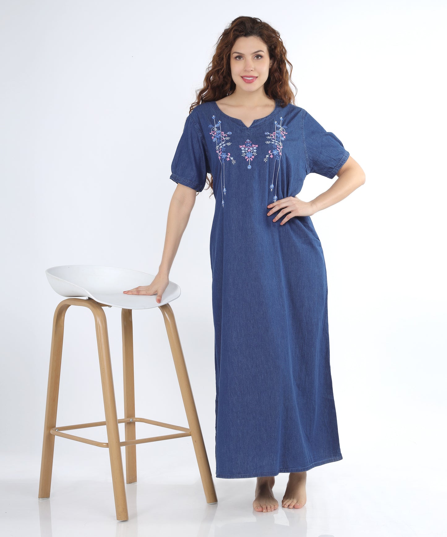 Model wearing the Cefalu Women’s Denim Gown in blue, styled for a cozy evening at home.