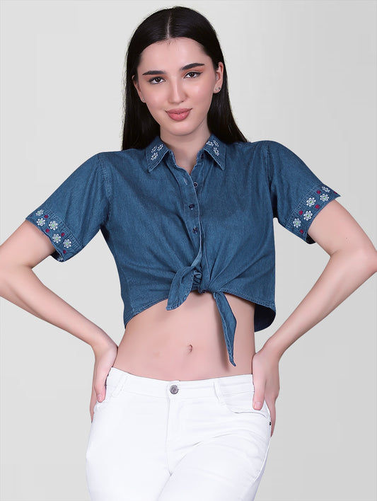 Close-up of the knotted front detail of Women’s Blue Denim Crop Top, highlighting the trendy and stylish design.