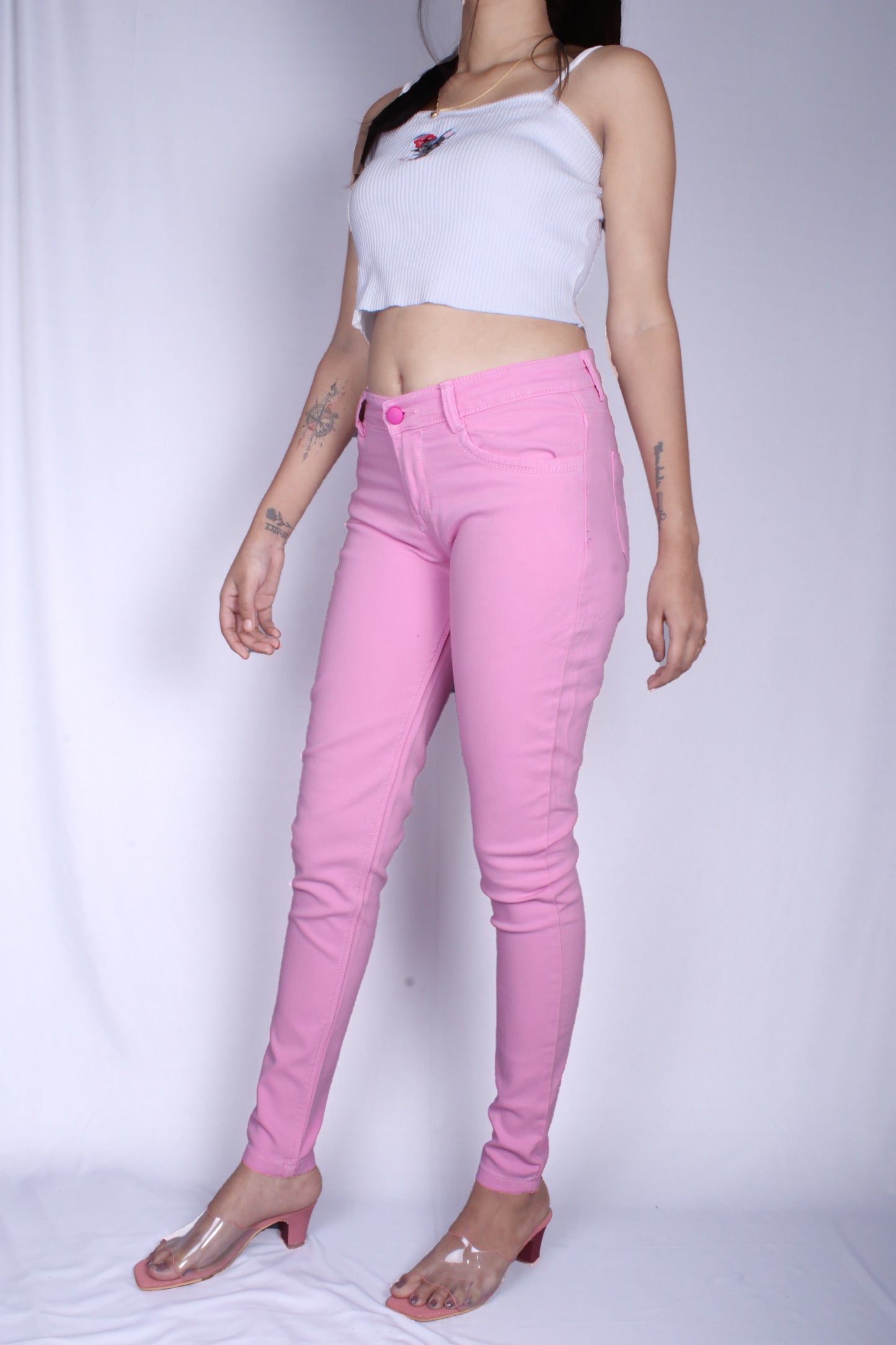 Left side view of Cefalu®️ Women’s Pink Slim Fit Jeans, emphasizing the slim fit and stretchable fabric.