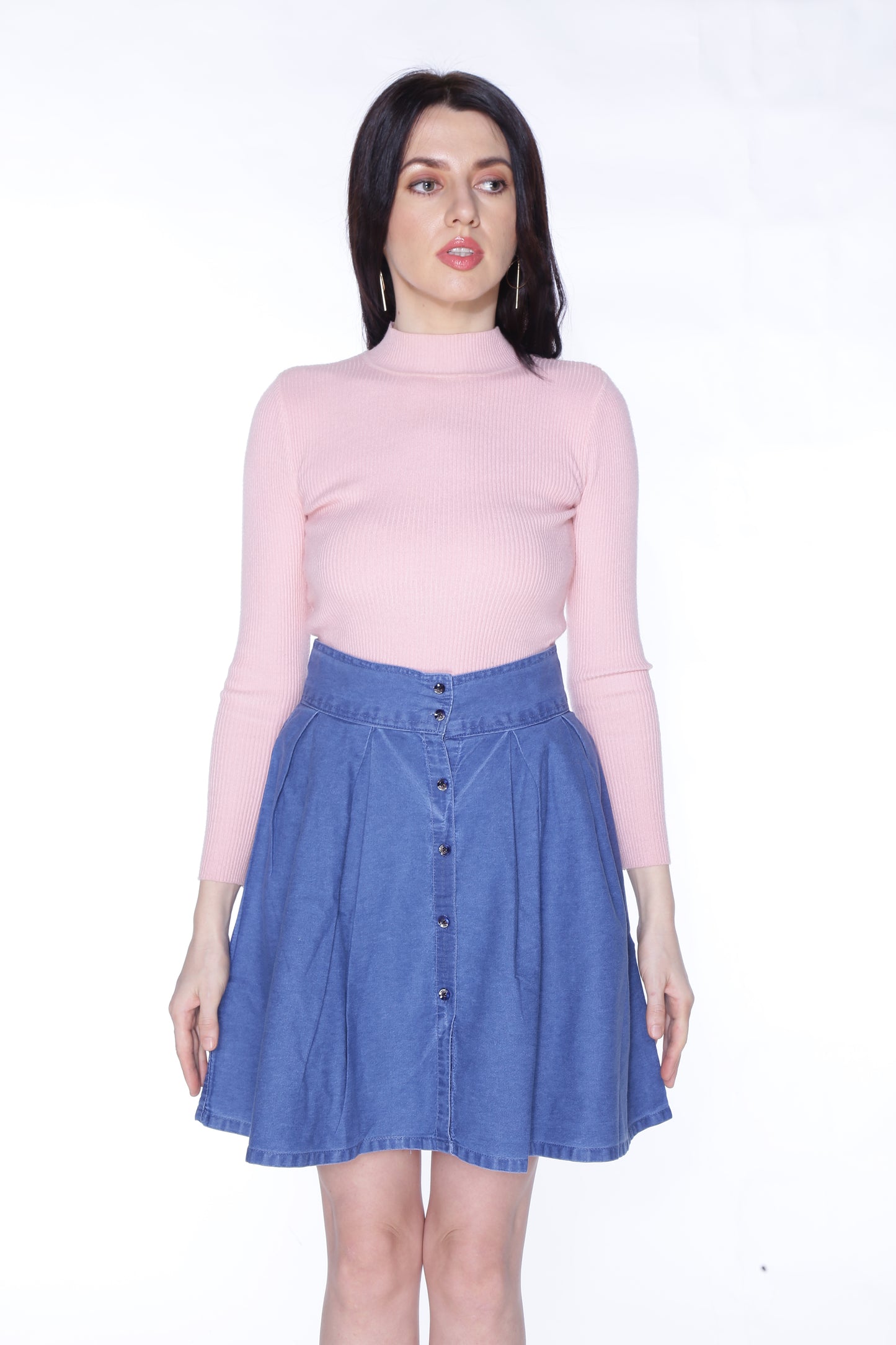 Side view of Cefalu®️ Women’s Blue Denim Mini Skirt, focusing on the unique full open button detail and the 20cm hemline.