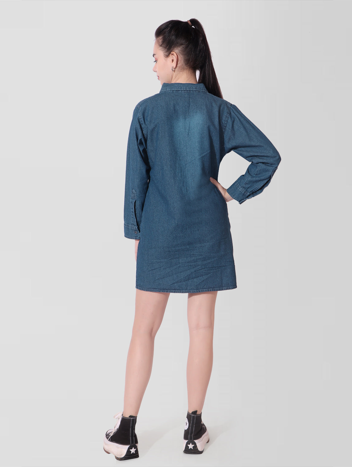 Back view of Women’s Collared Blue Denim Shirt Dress showcasing full-length sleeves and stylish belt detail.