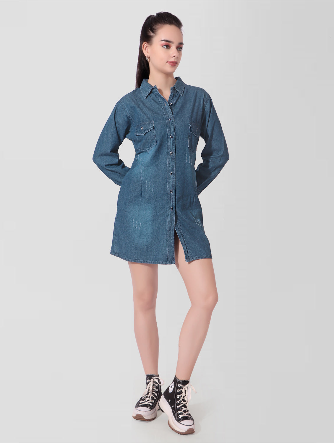 Side view of Women’s Blue Denim Shirt Dress demonstrating the above-knee length and elegant, full sleeve design.