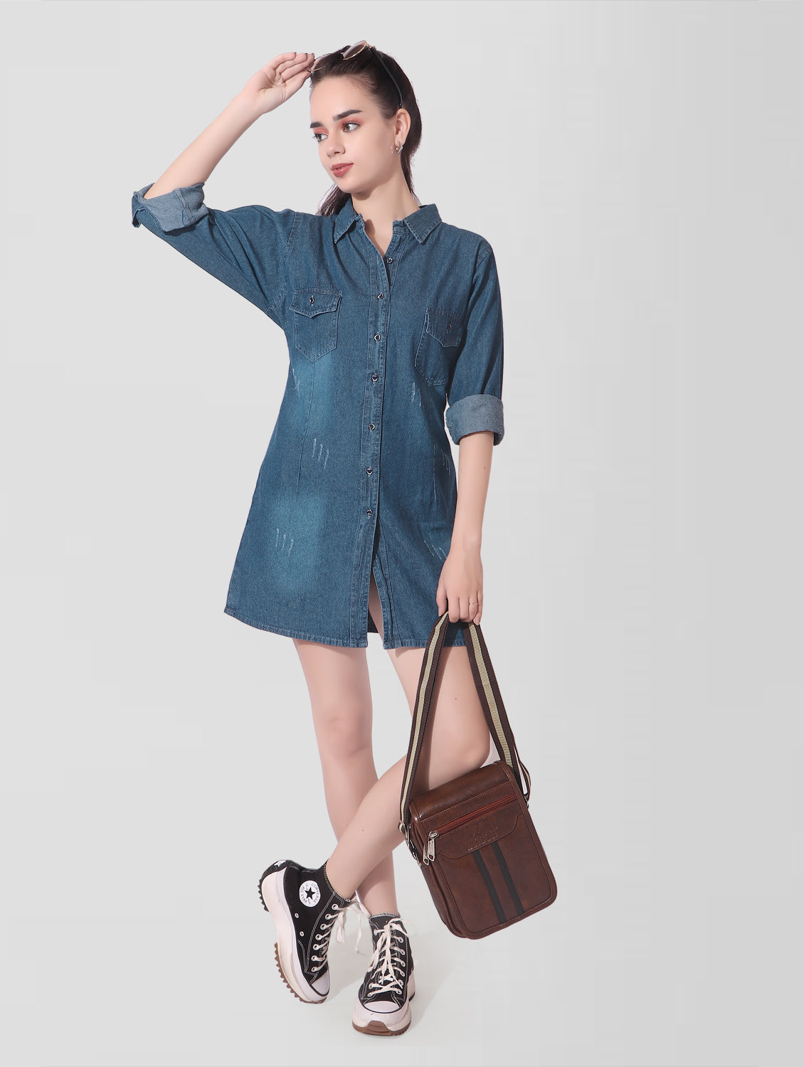 Women’s Blue Denim Shirt Dress styled with accessories and heels, perfect for casual outings and semi-formal events.