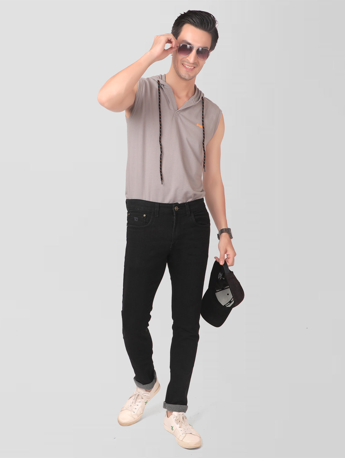 Model wearing TCI Men’s Black Slim Fit Jeans – showcasing the fit and style from a full-body perspective.