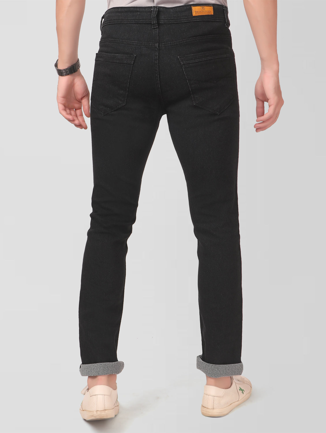 TCI Men’s Black Slim Fit Jeans – Back view highlighting the brand patch on the waistband and overall fit.