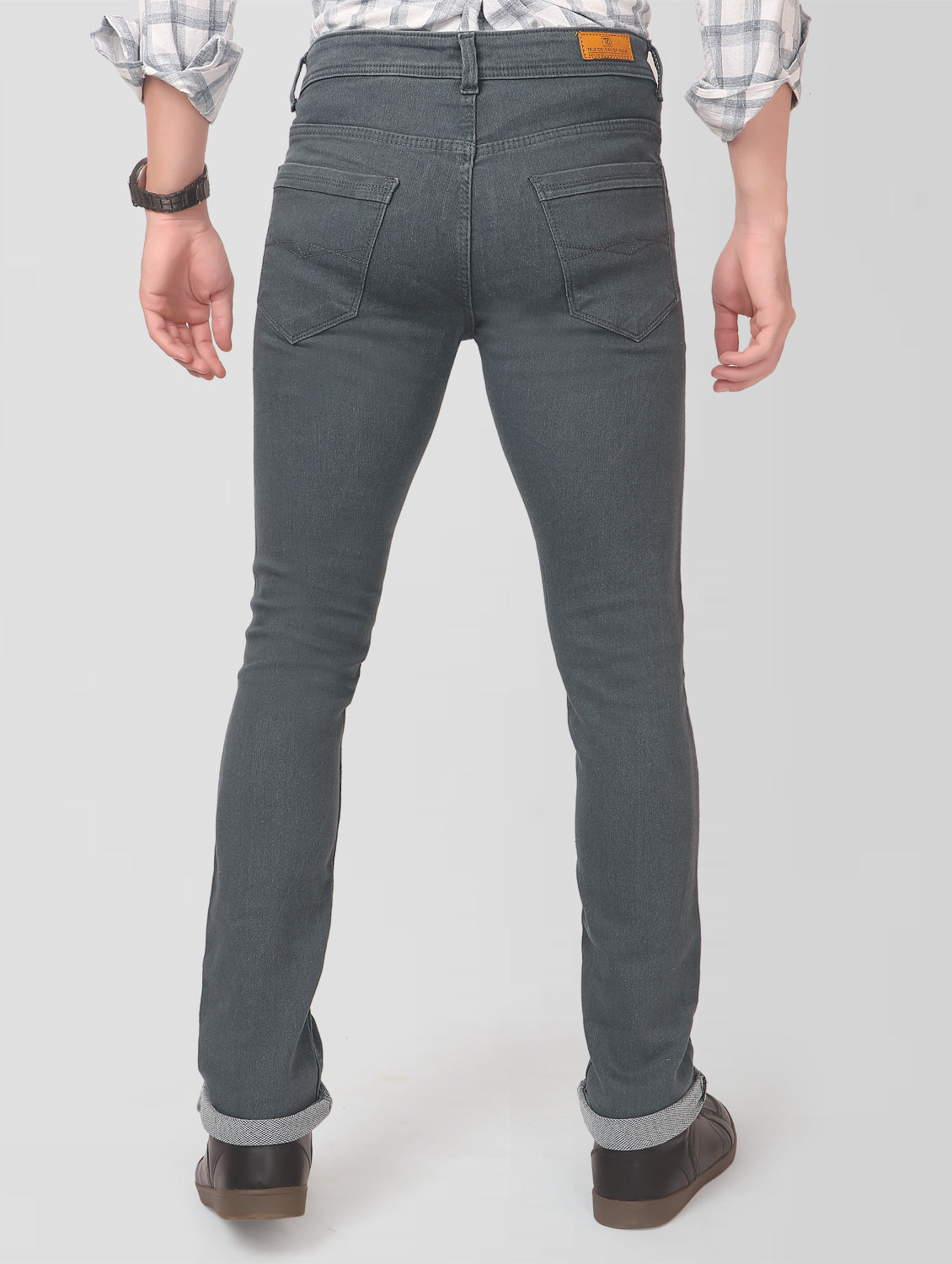 TCI Men’s Grey Slim Fit Jeans – Back view highlighting the brand patch on the waistband and overall fit.