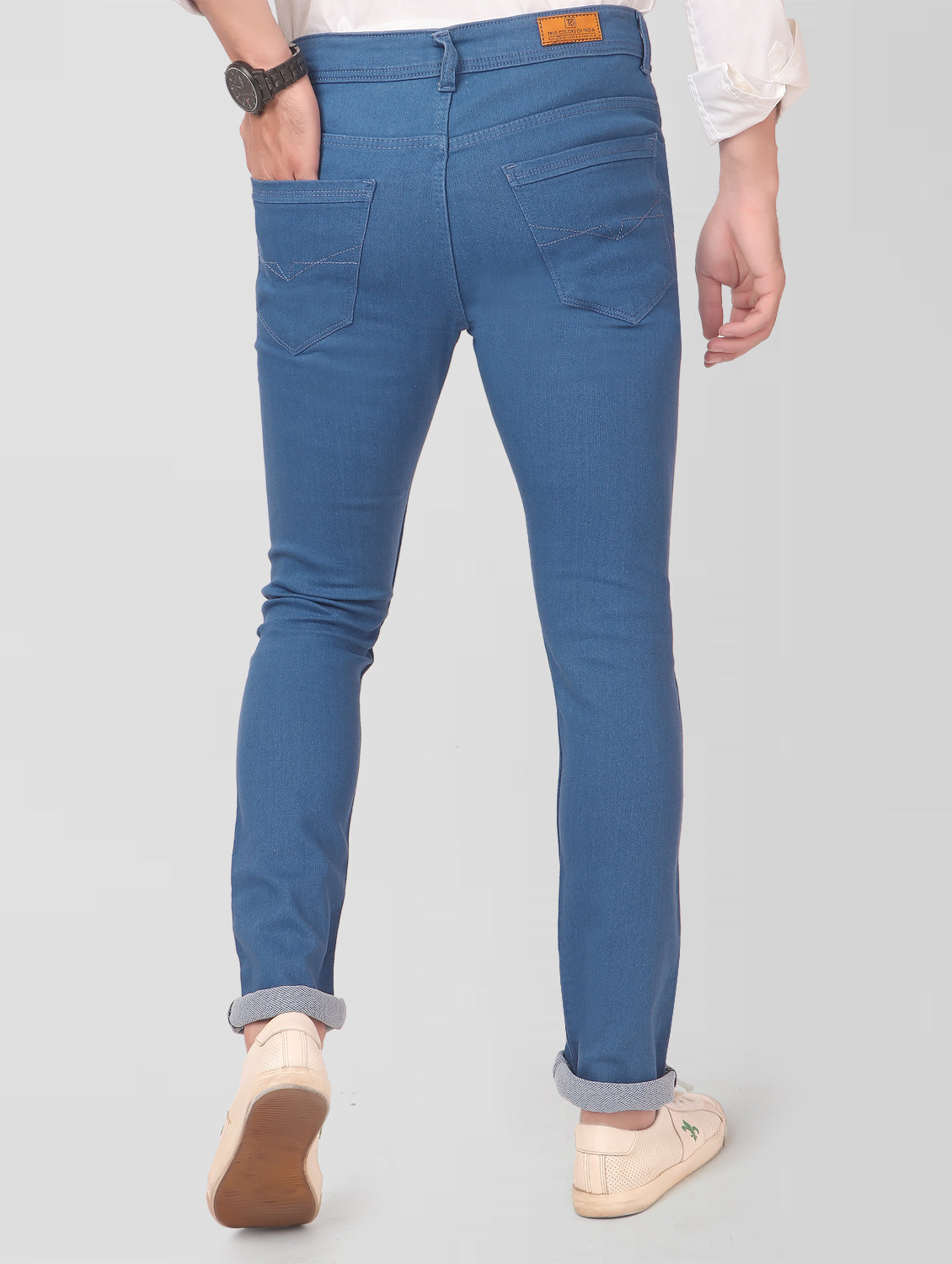 TCI Men’s Blue Slim Fit Jeans – Back view highlighting the brand patch on the waistband and overall fit.